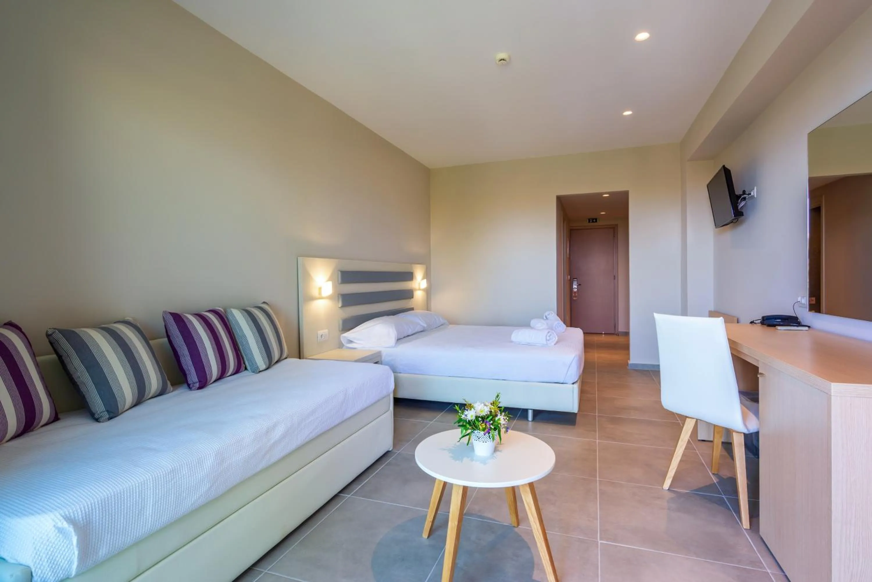 Bed in CNic Gemini Hotel