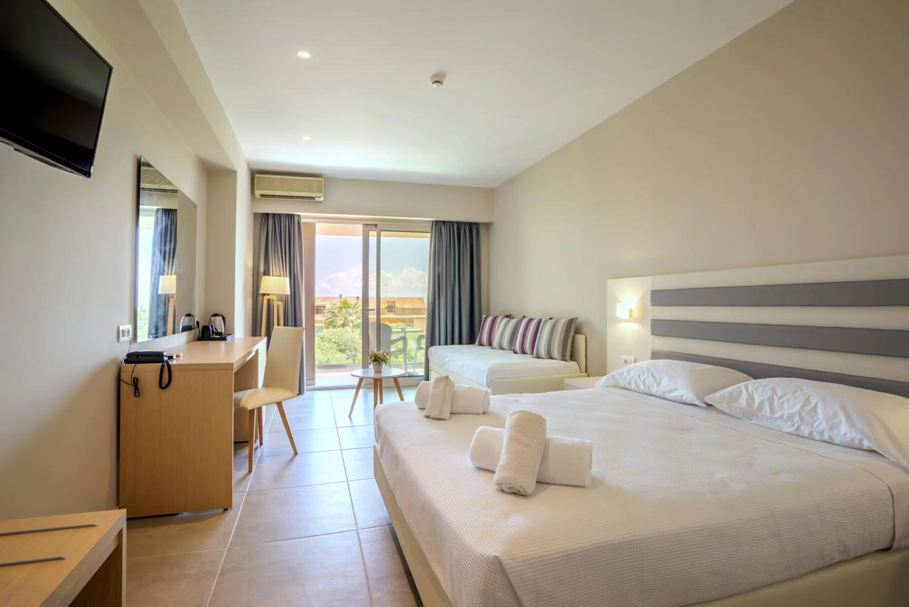 Bed in CNic Gemini Hotel