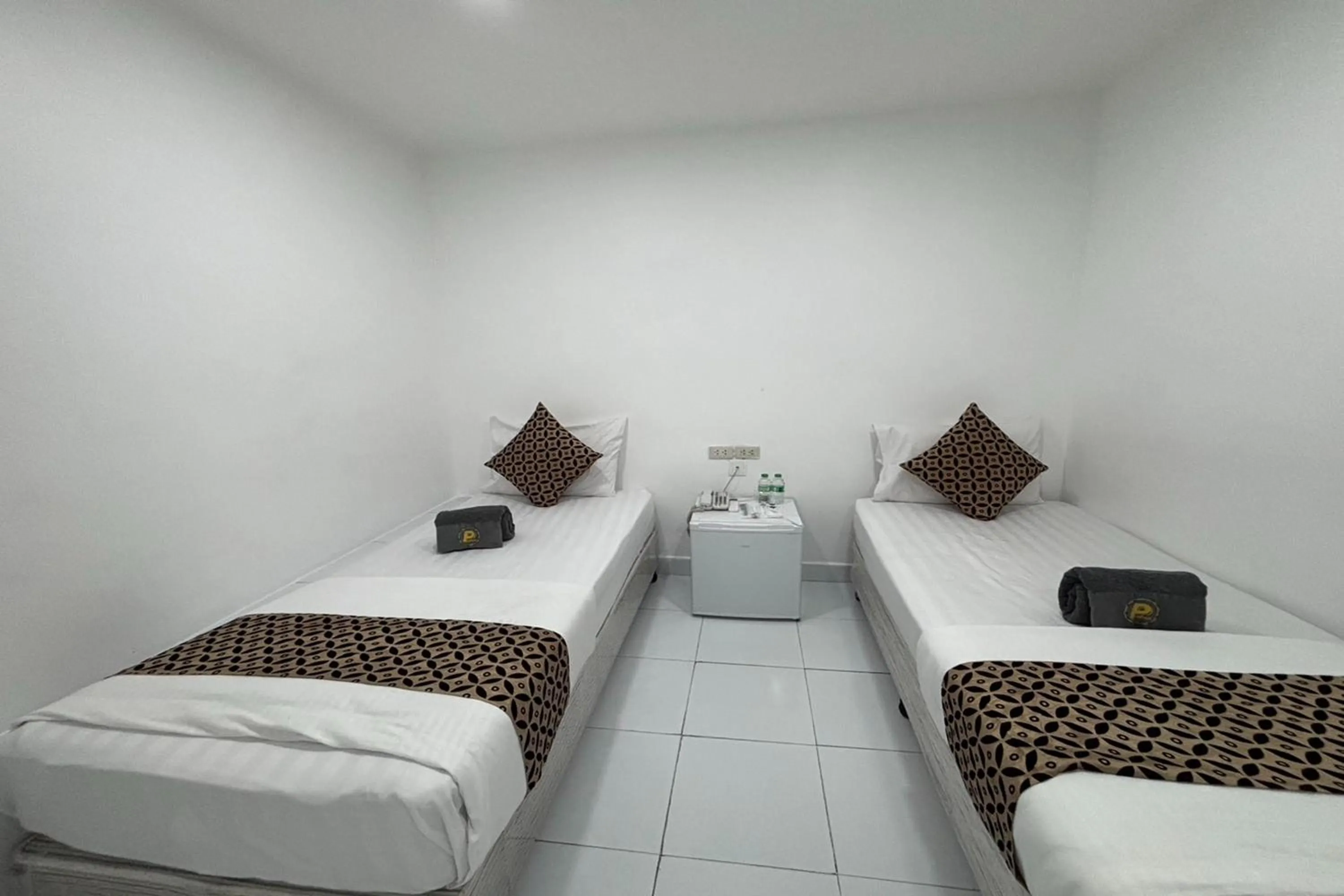 Bed in Papa Ji Hotel and Restaurant