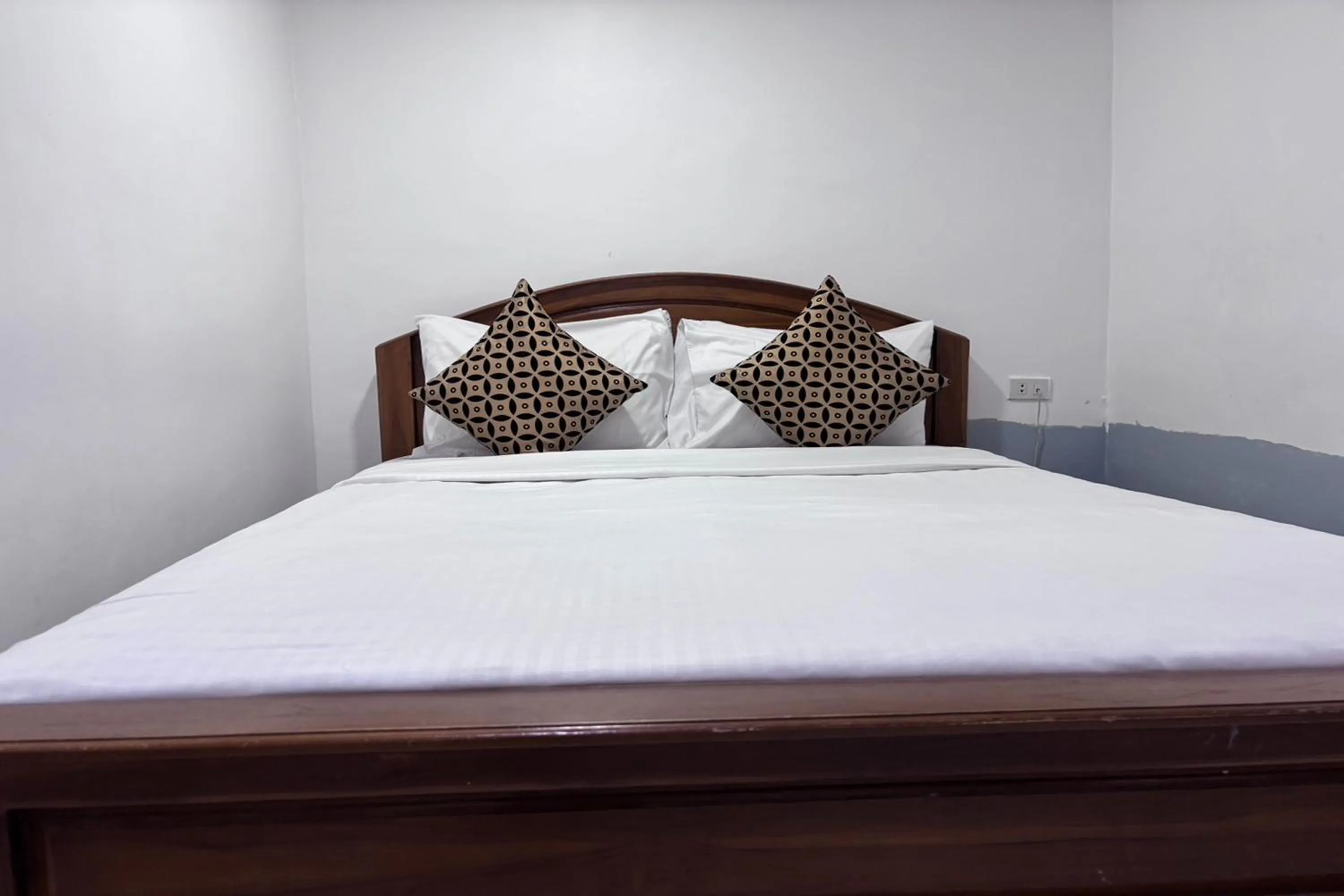 Bed in Papa Ji Hotel and Restaurant