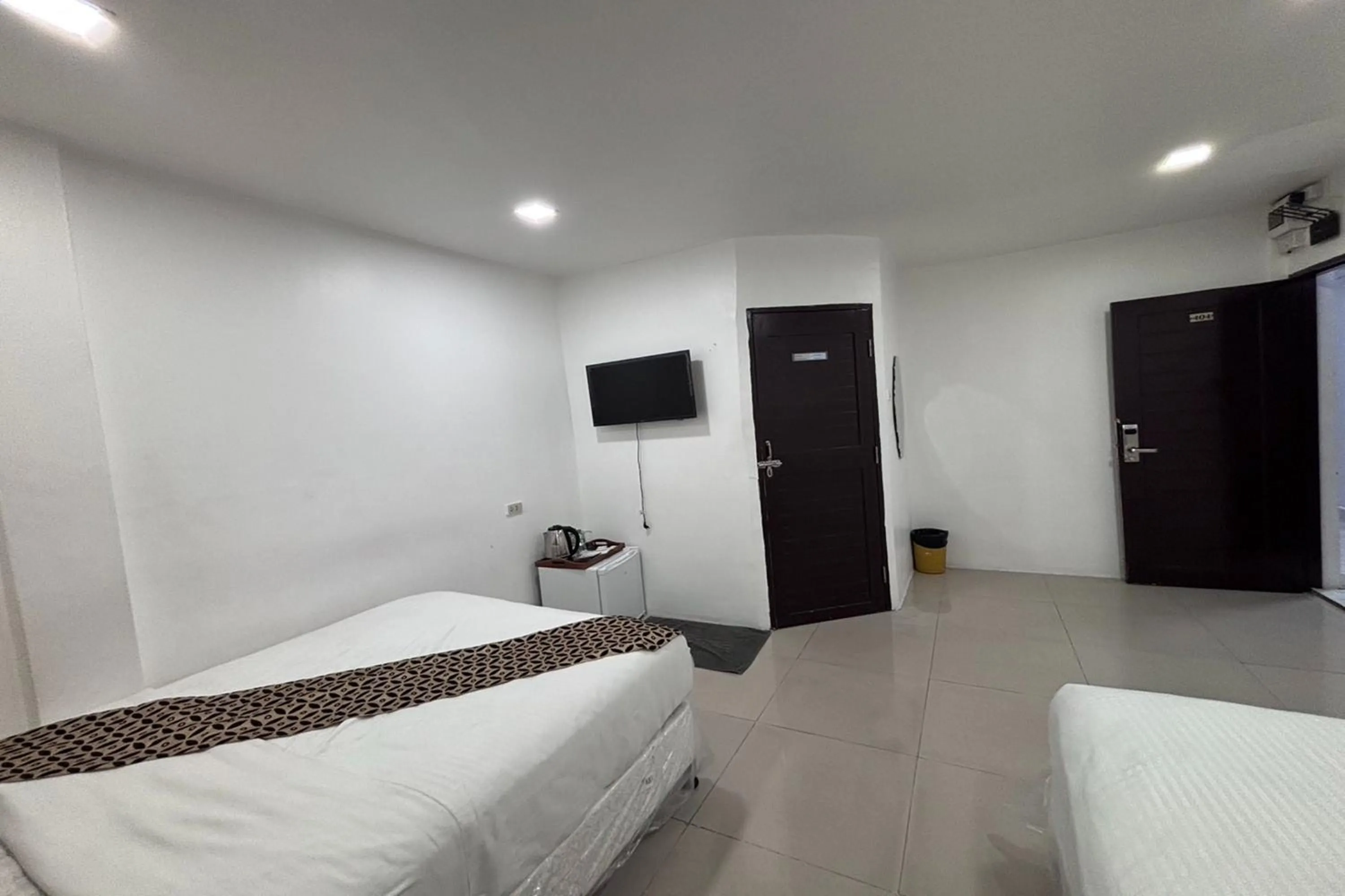 Bed in Papa Ji Hotel and Restaurant