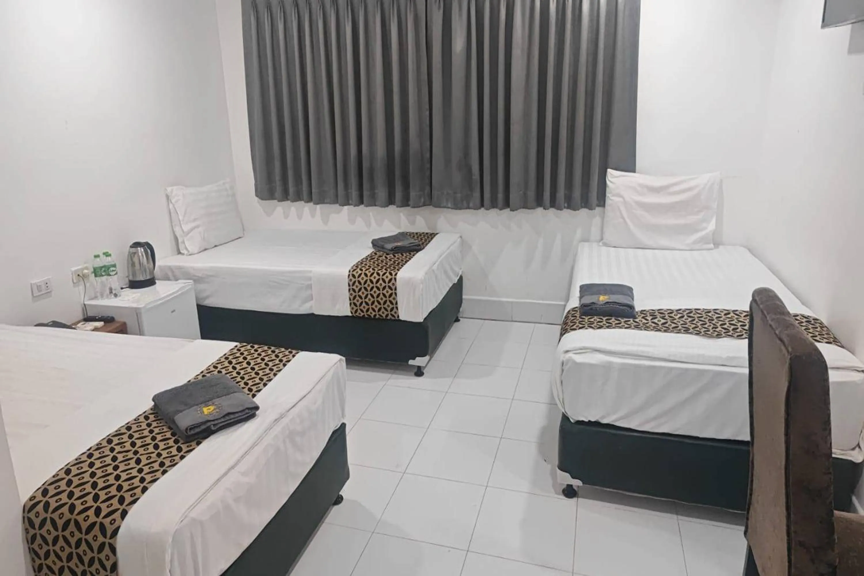 Bed in Papa Ji Hotel and Restaurant