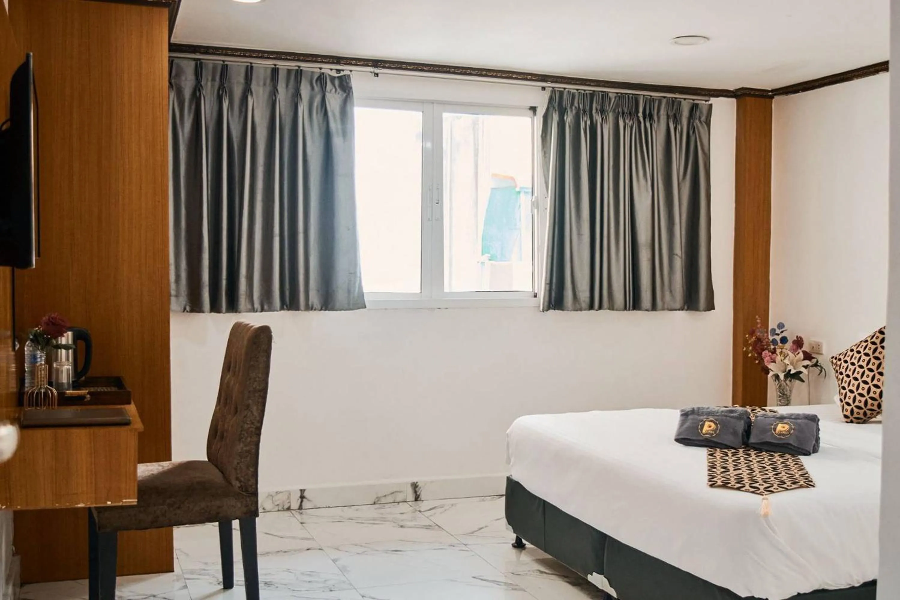 Bed in Papa Ji Hotel and Restaurant