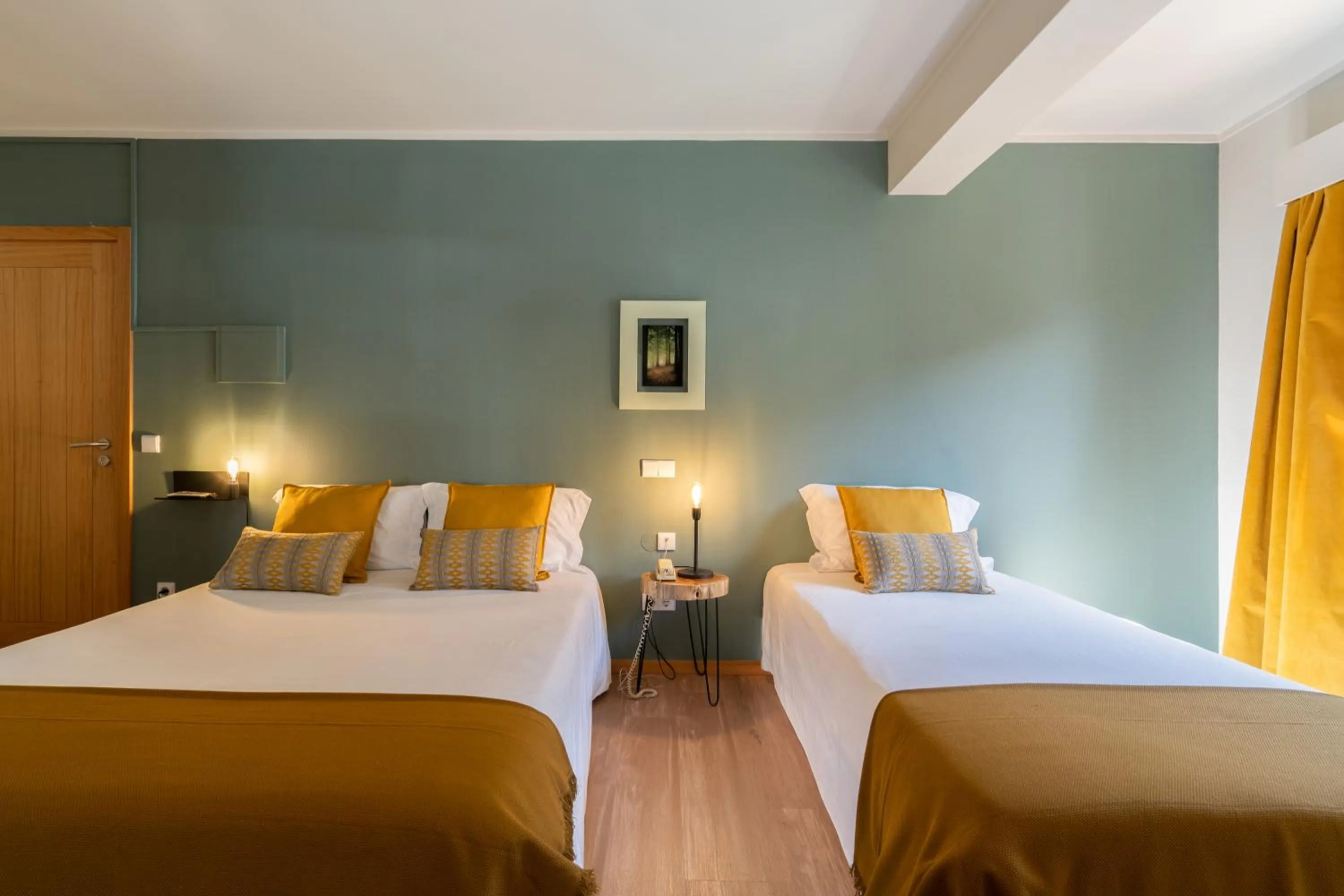 Bed in Hotel Carvalho Araujo