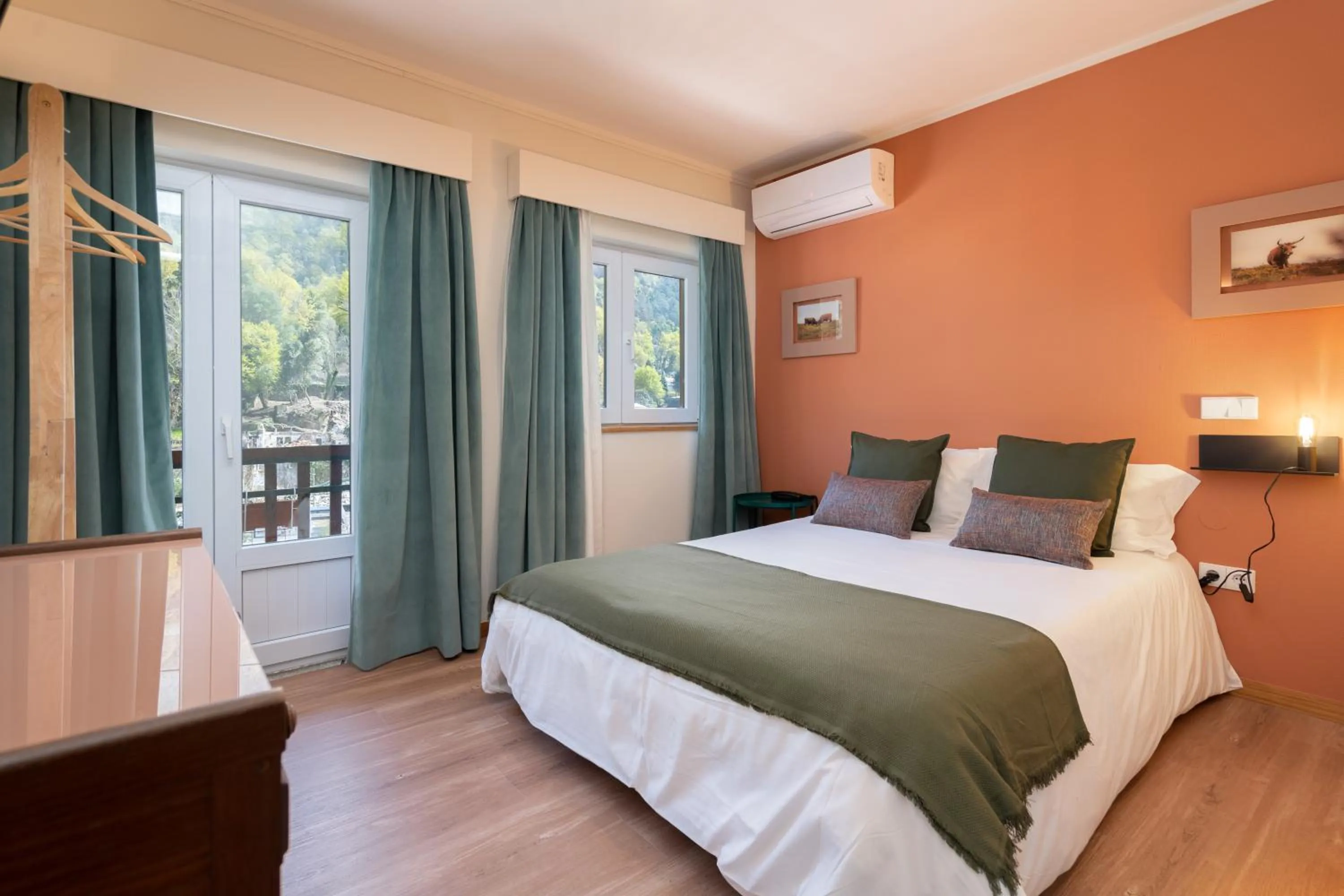 Bed in Hotel Carvalho Araujo