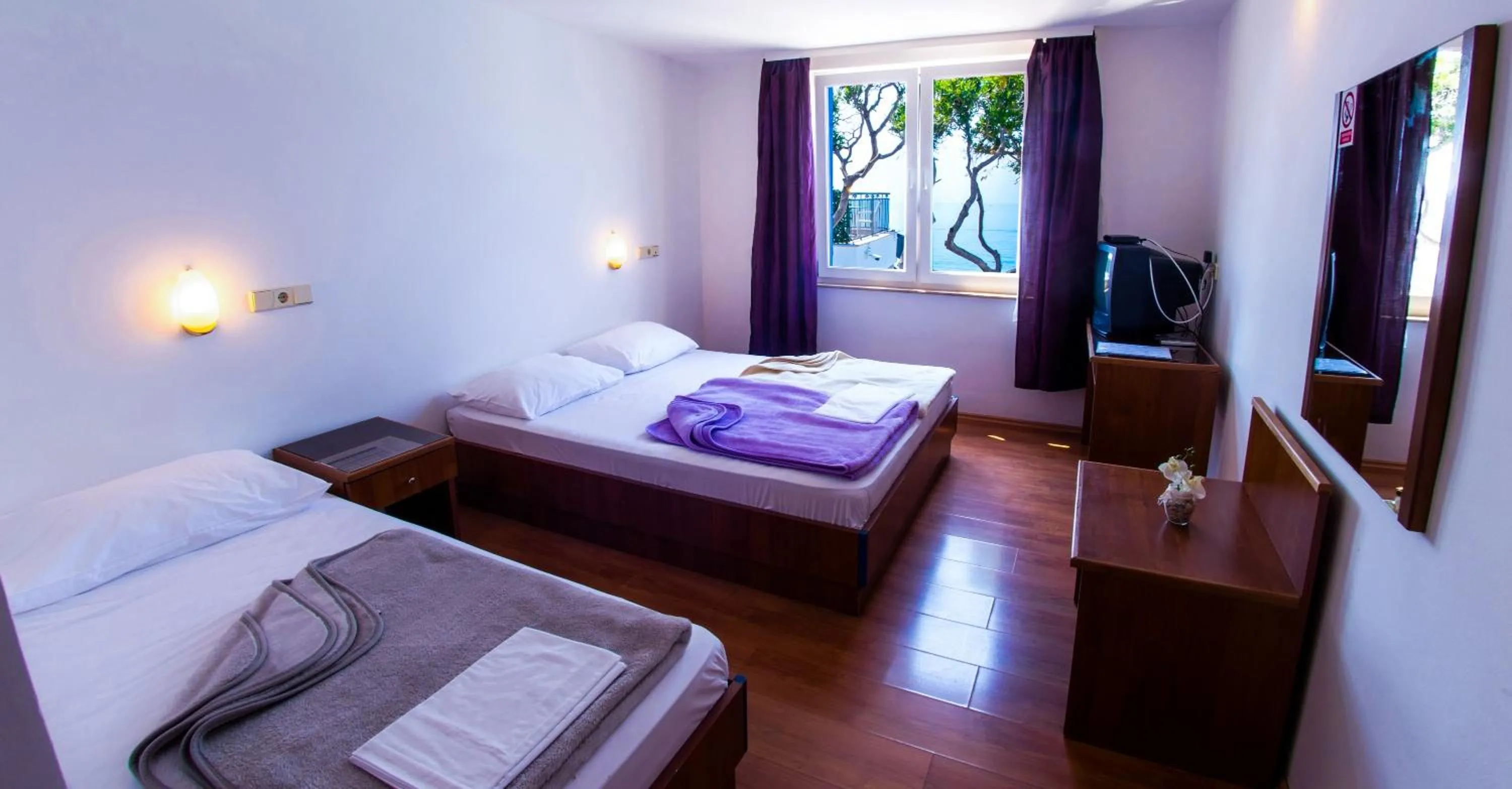 Photo of the whole room, Bed in Beach Hotel