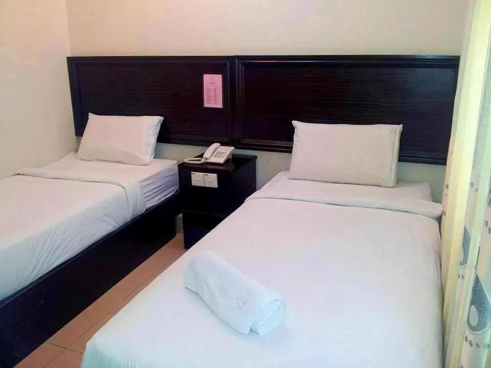 Bed in Hotel Bintang Indah