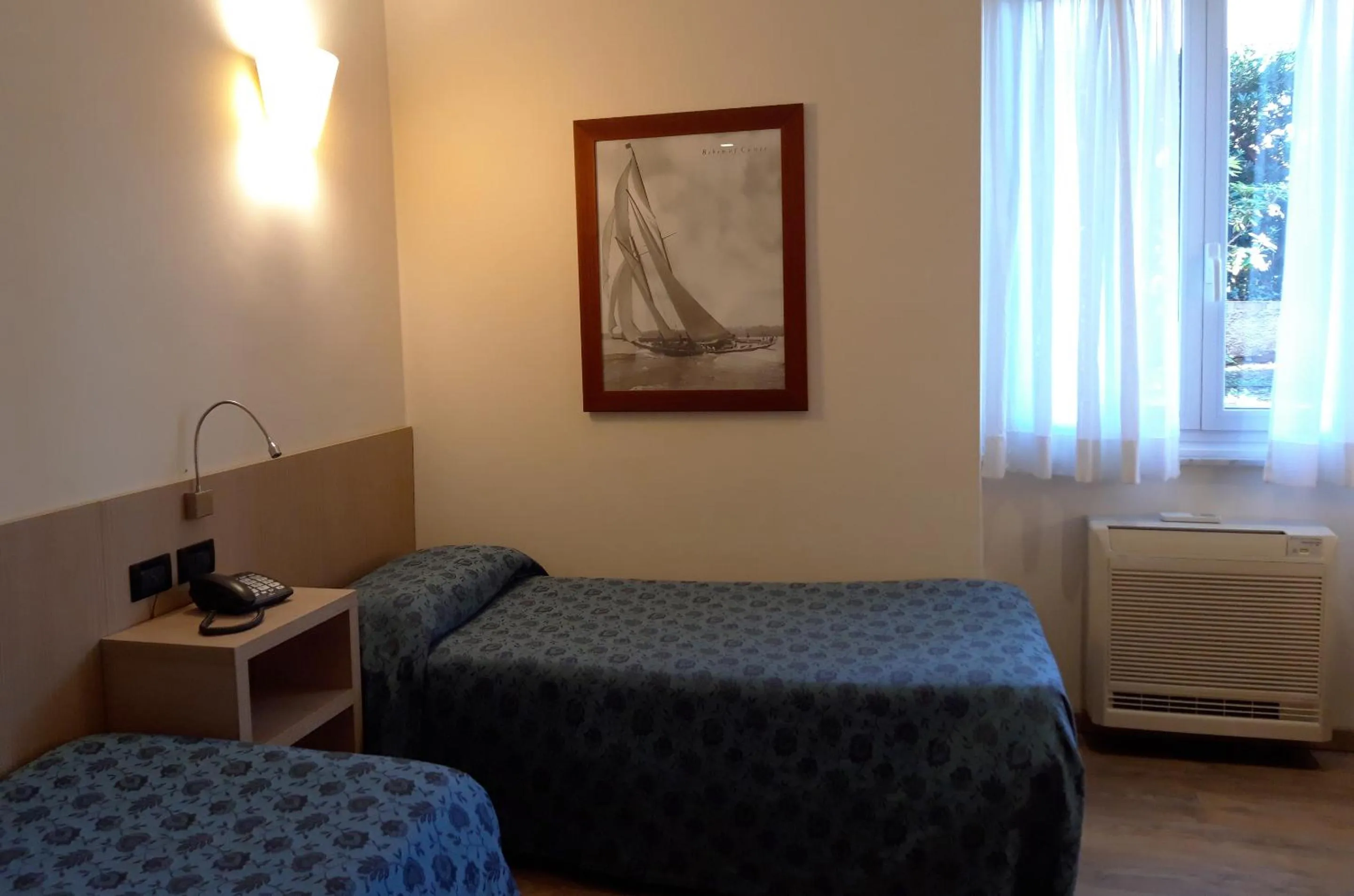 Bed in Hotel Esperia