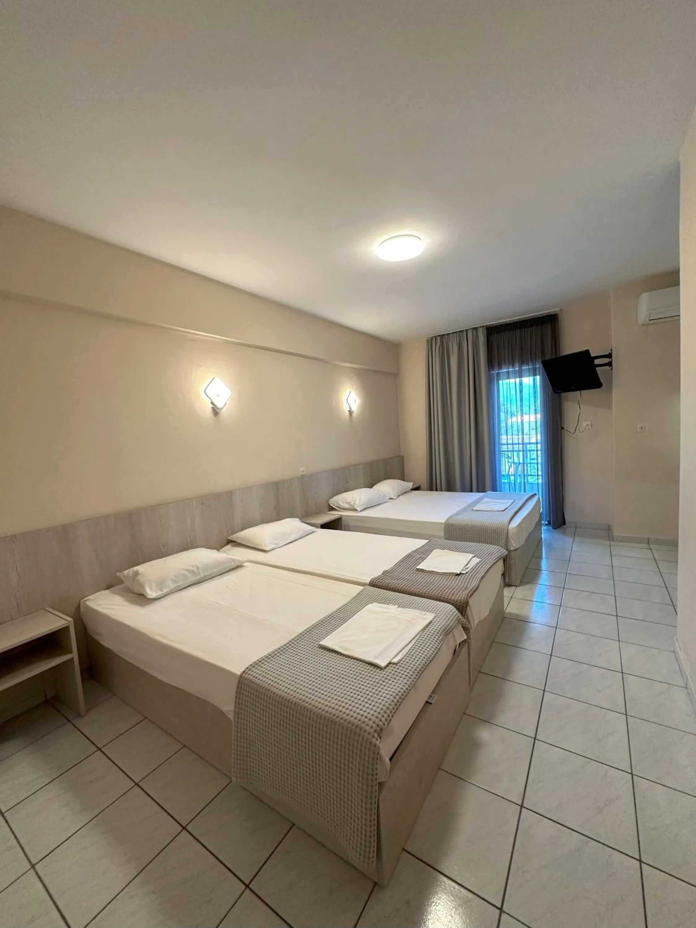 Bed in Hotel Afrodite