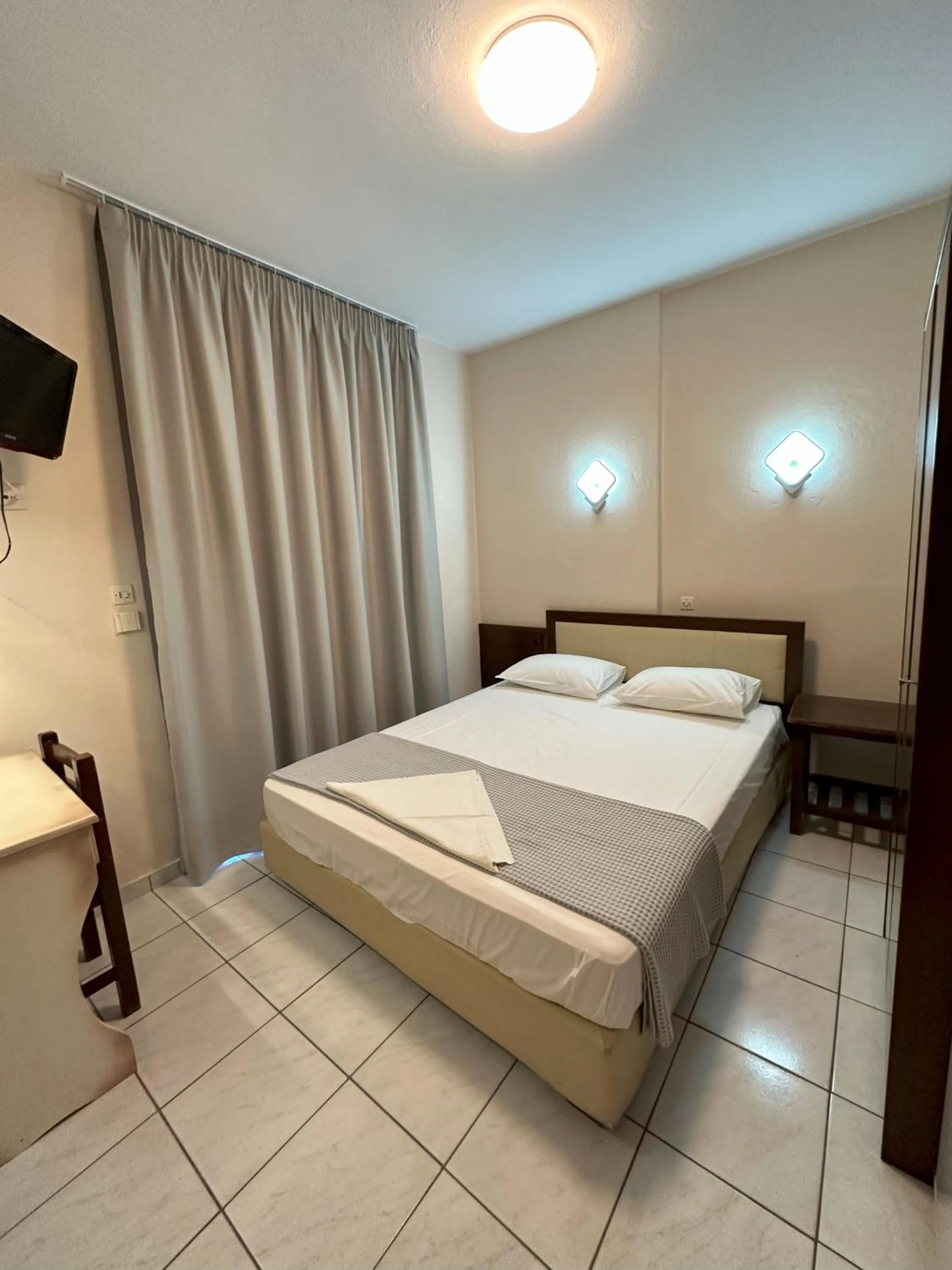 Bed in Hotel Afrodite