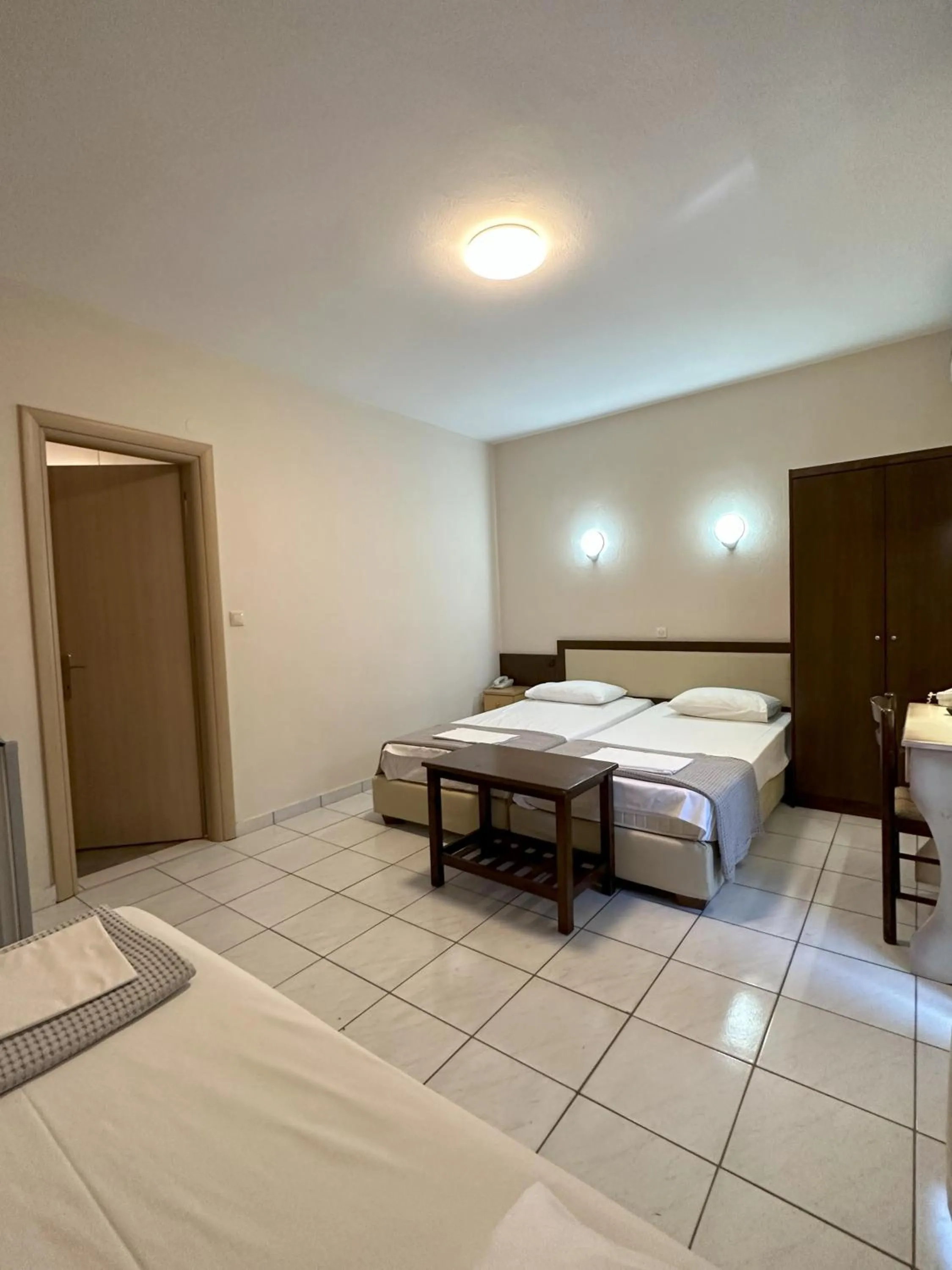 Bed in Hotel Afrodite