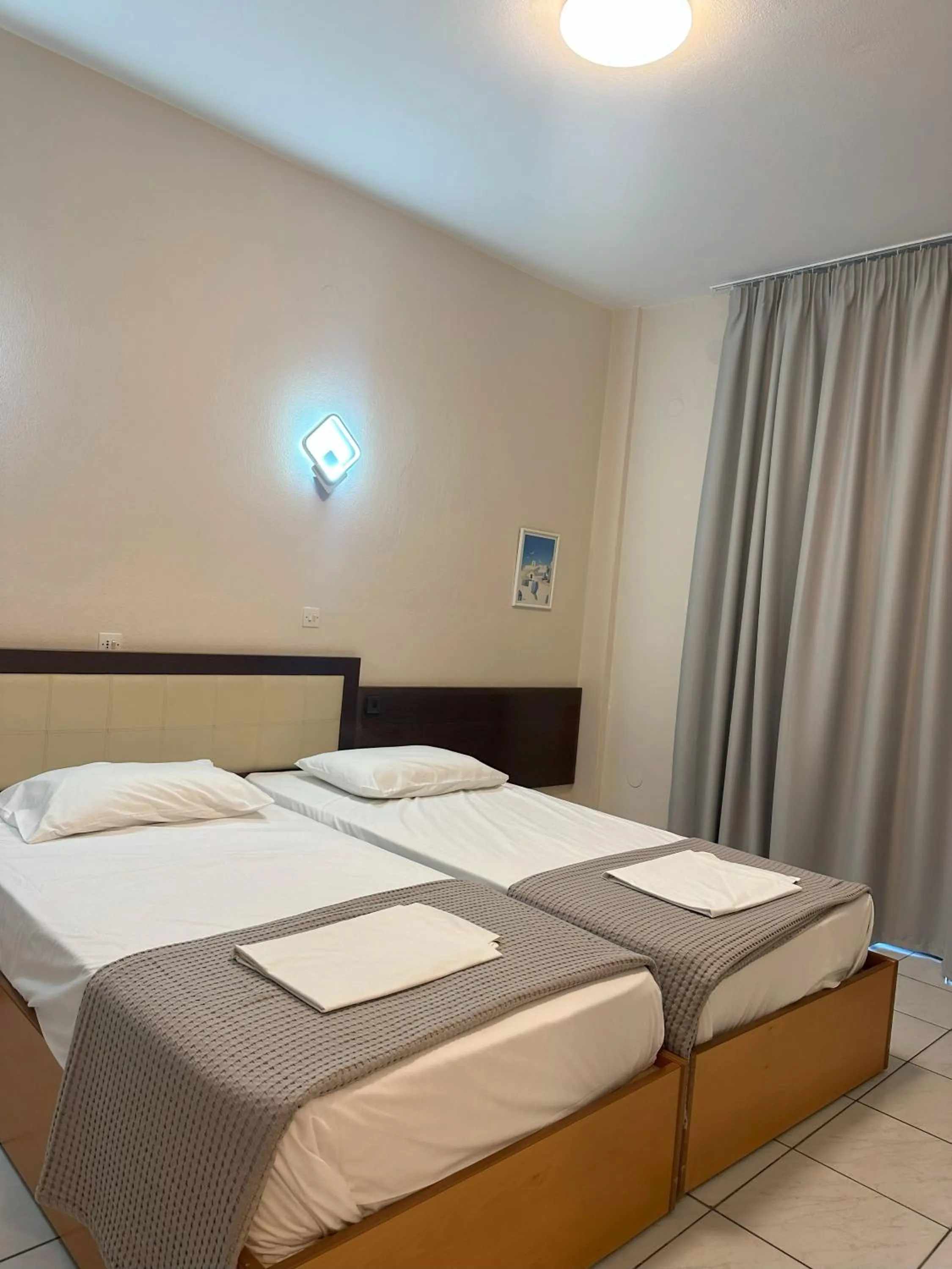 Bed in Hotel Afrodite