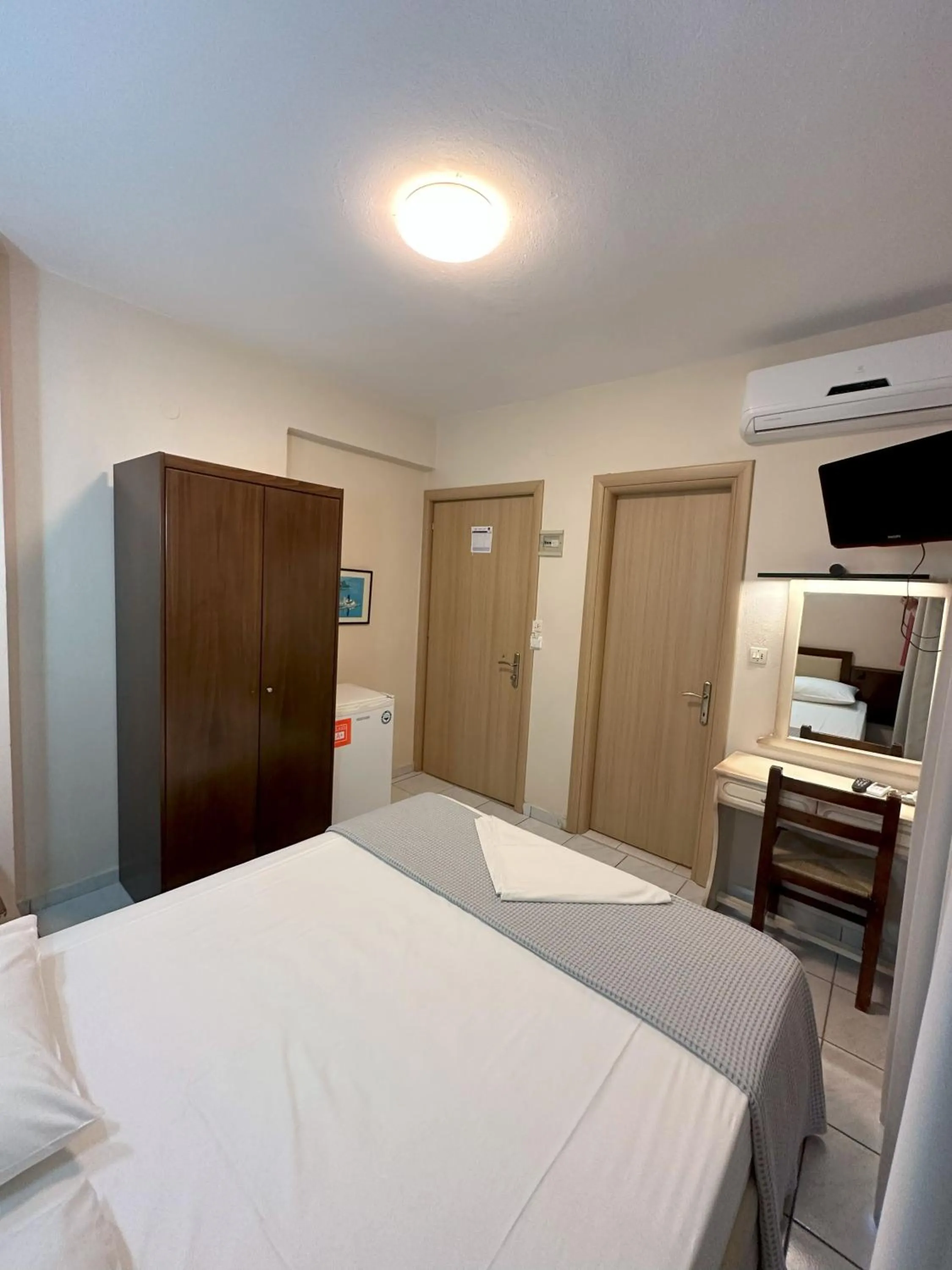 Bed in Hotel Afrodite