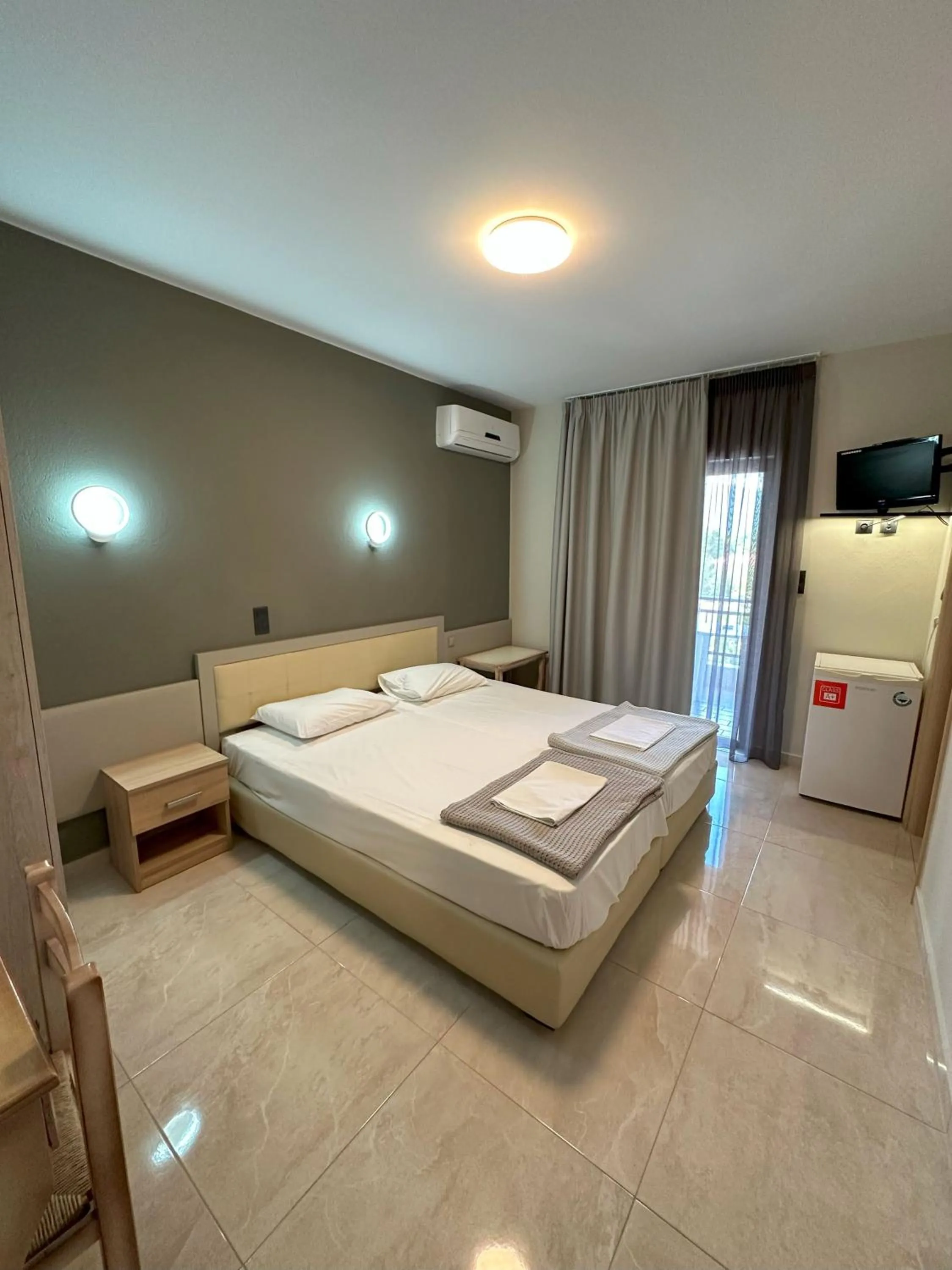 Bed in Hotel Afrodite