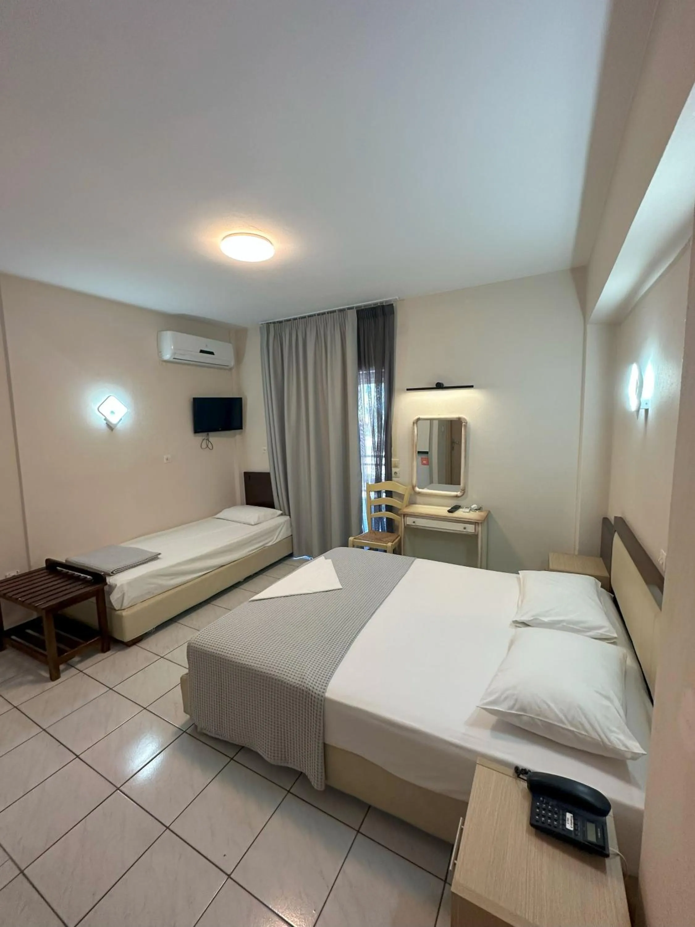 Bed in Hotel Afrodite