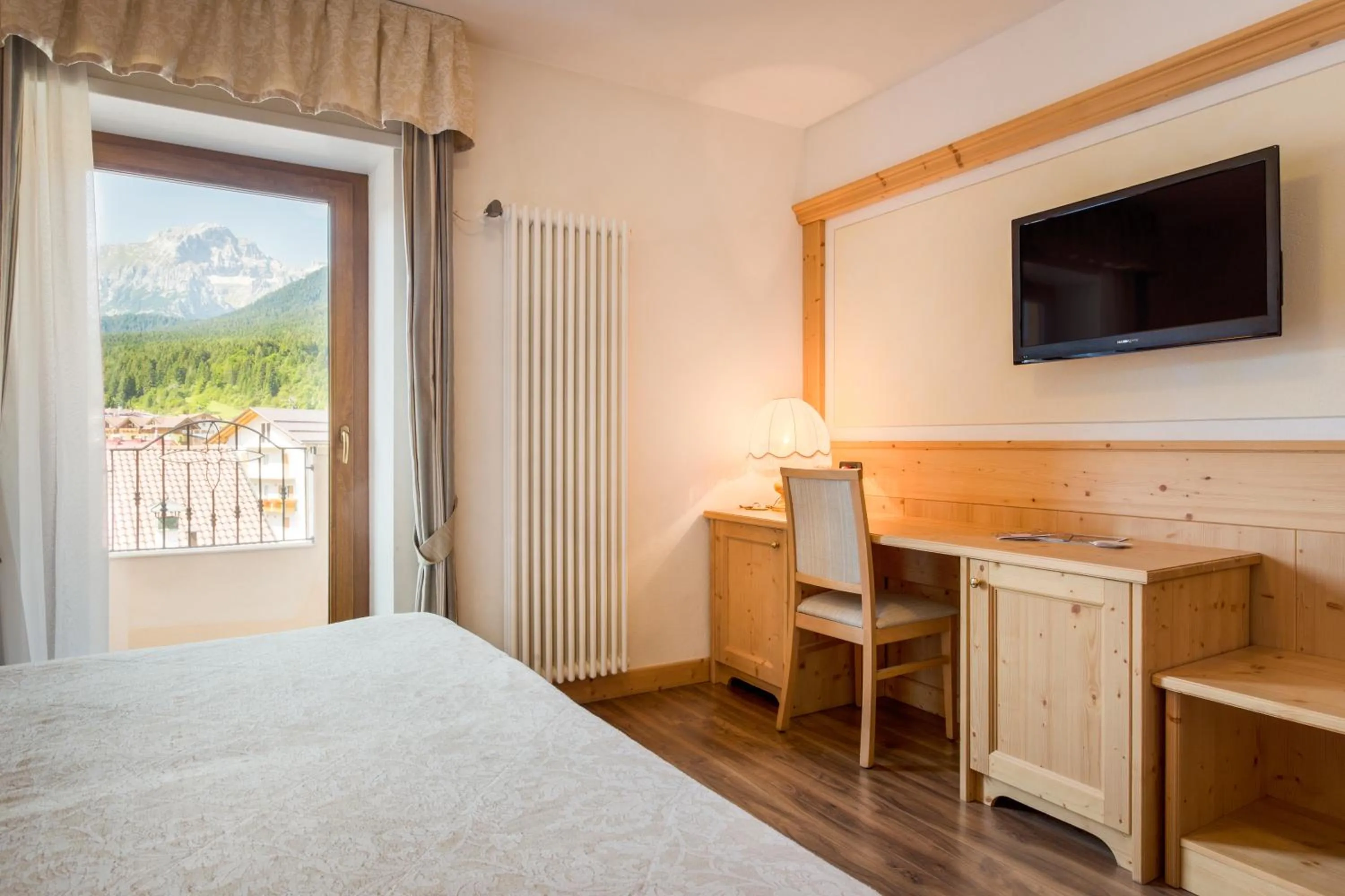 Bed in Hotel Stella Alpina