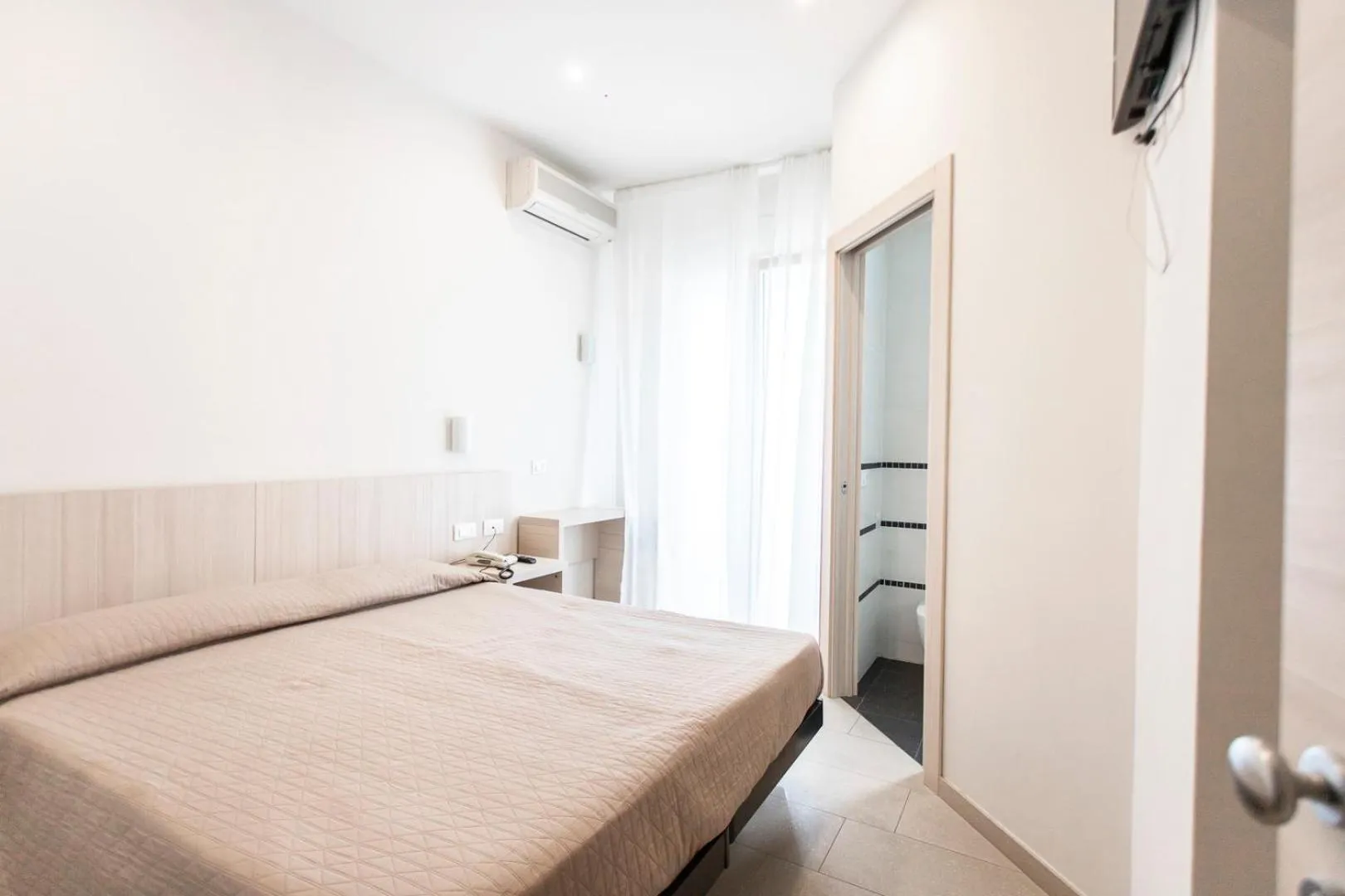 Bed in Hotel Primiana