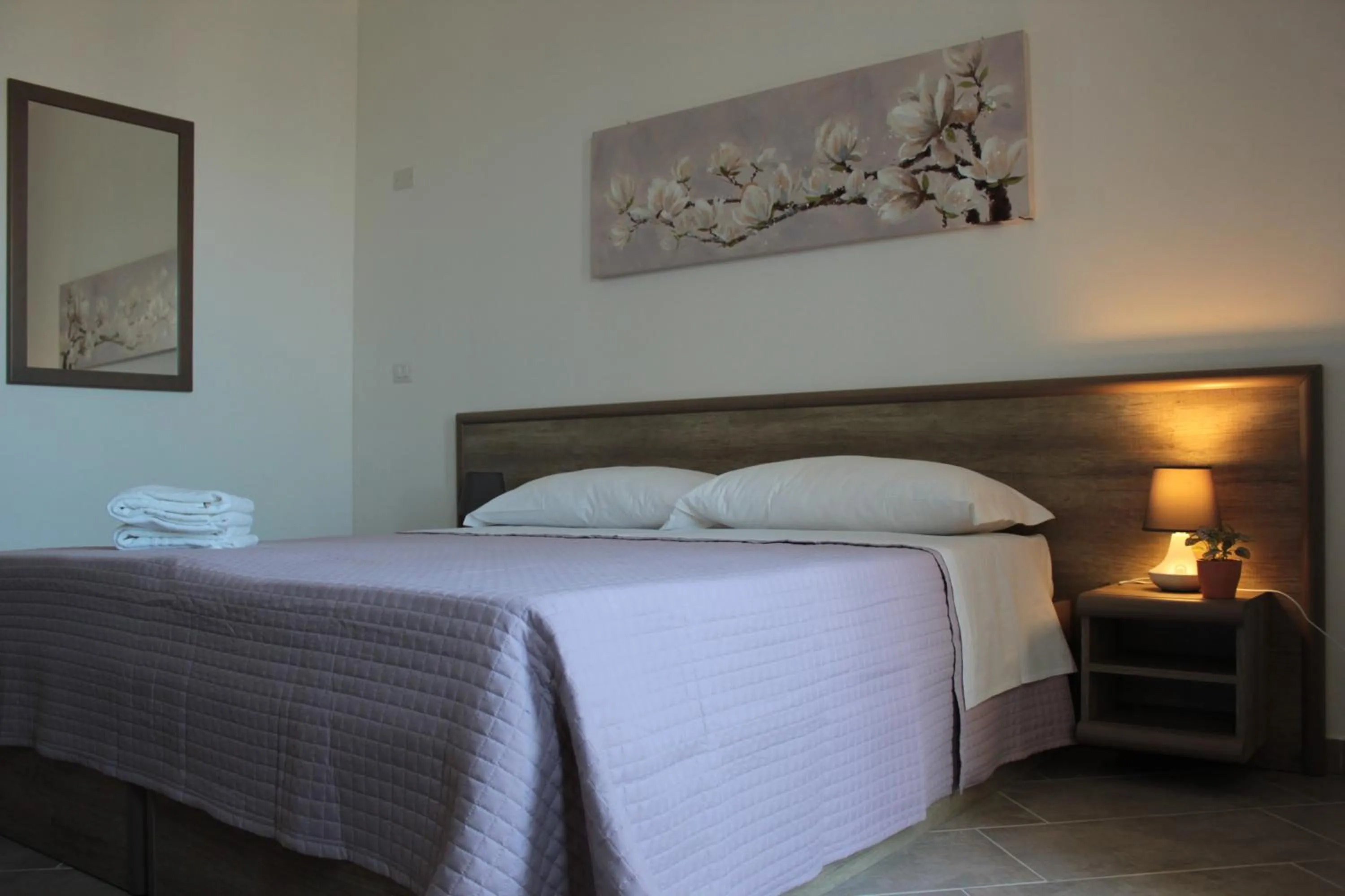 Bed in Mansio Residence & Hotel