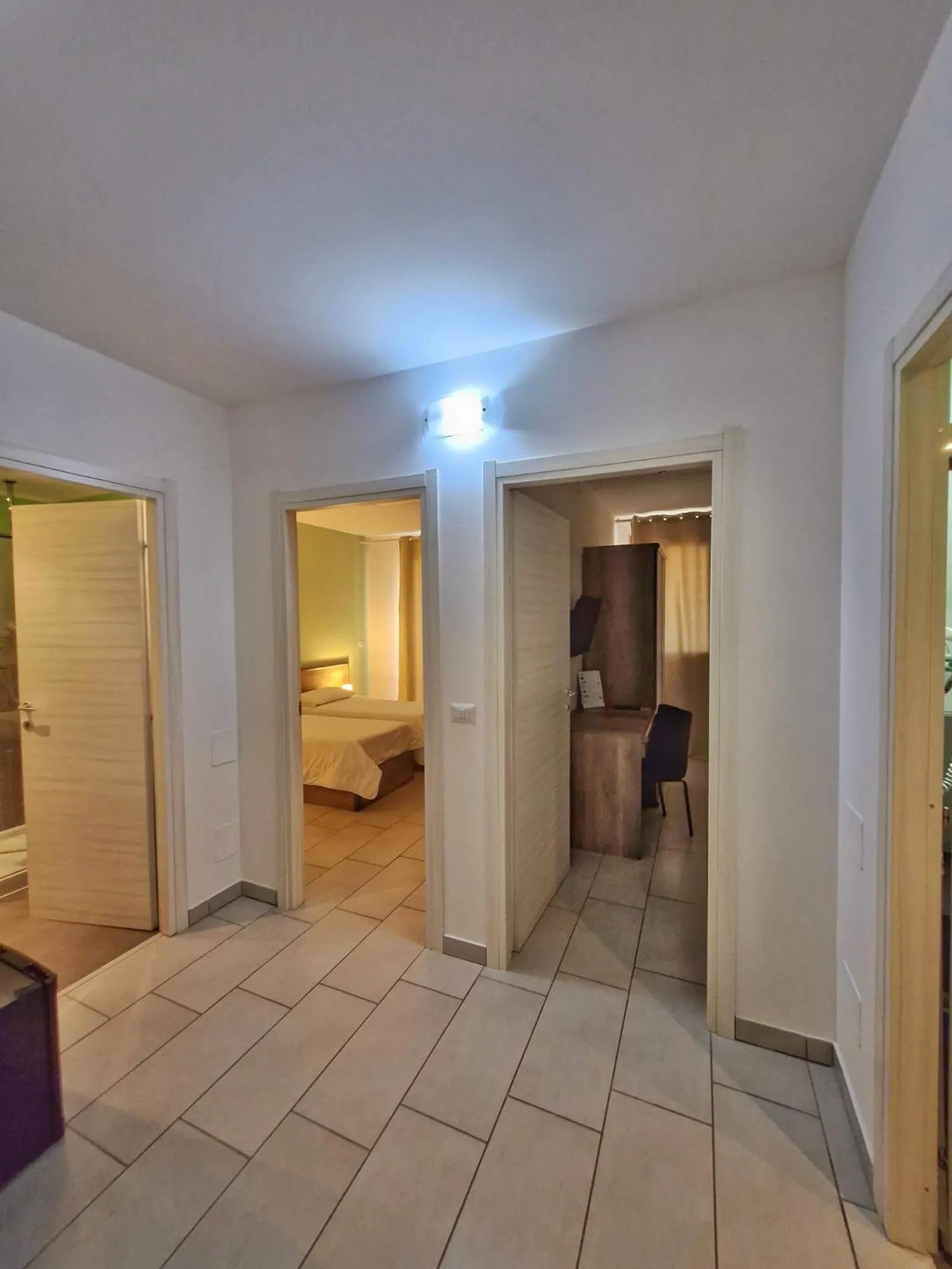 Bed in Mansio Residence & Hotel