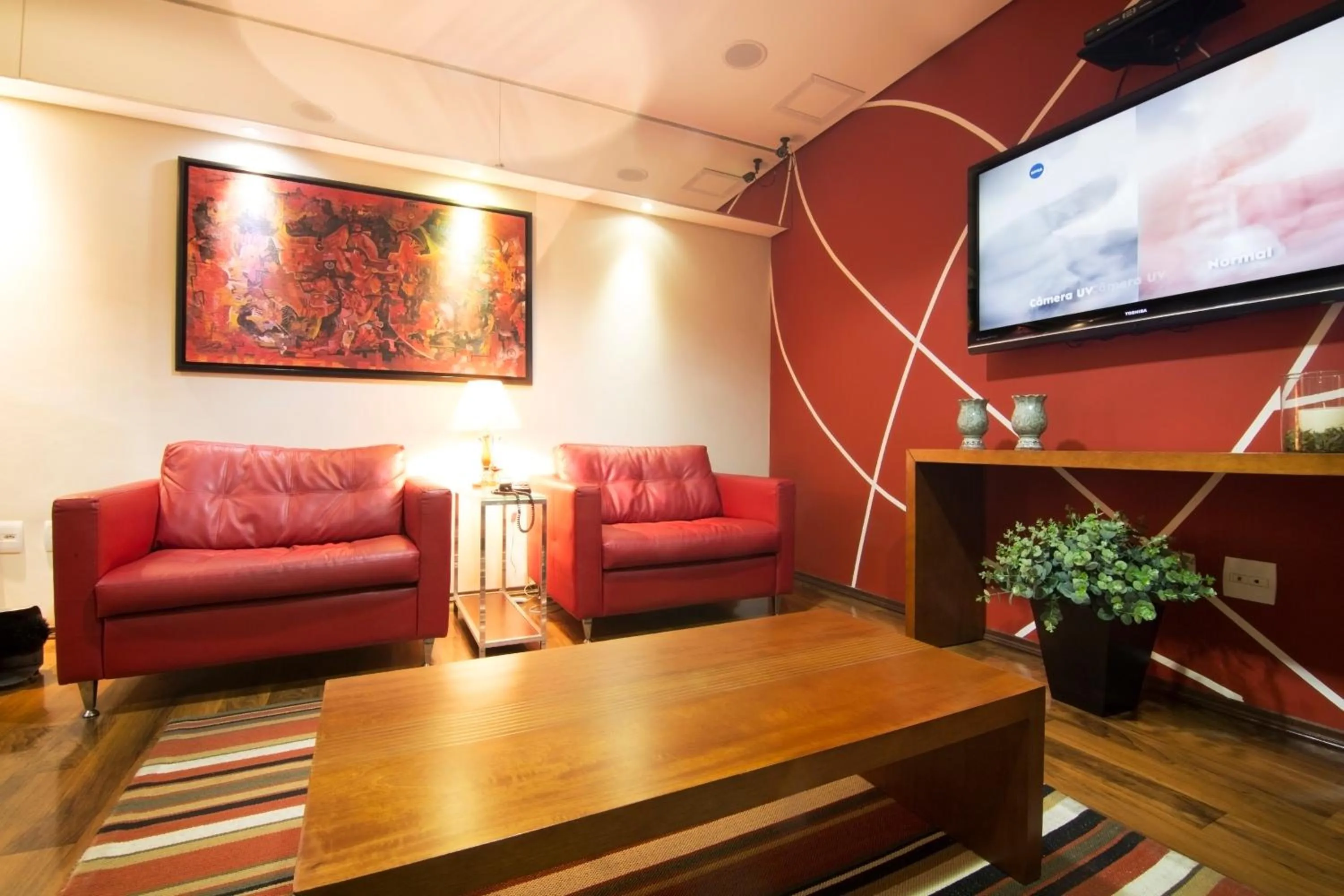 Communal lounge/ TV room in JR Hotel Ribeirão Preto