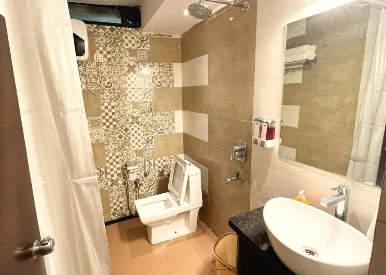 Toilet in Royal Palms Luxury Service Apartment