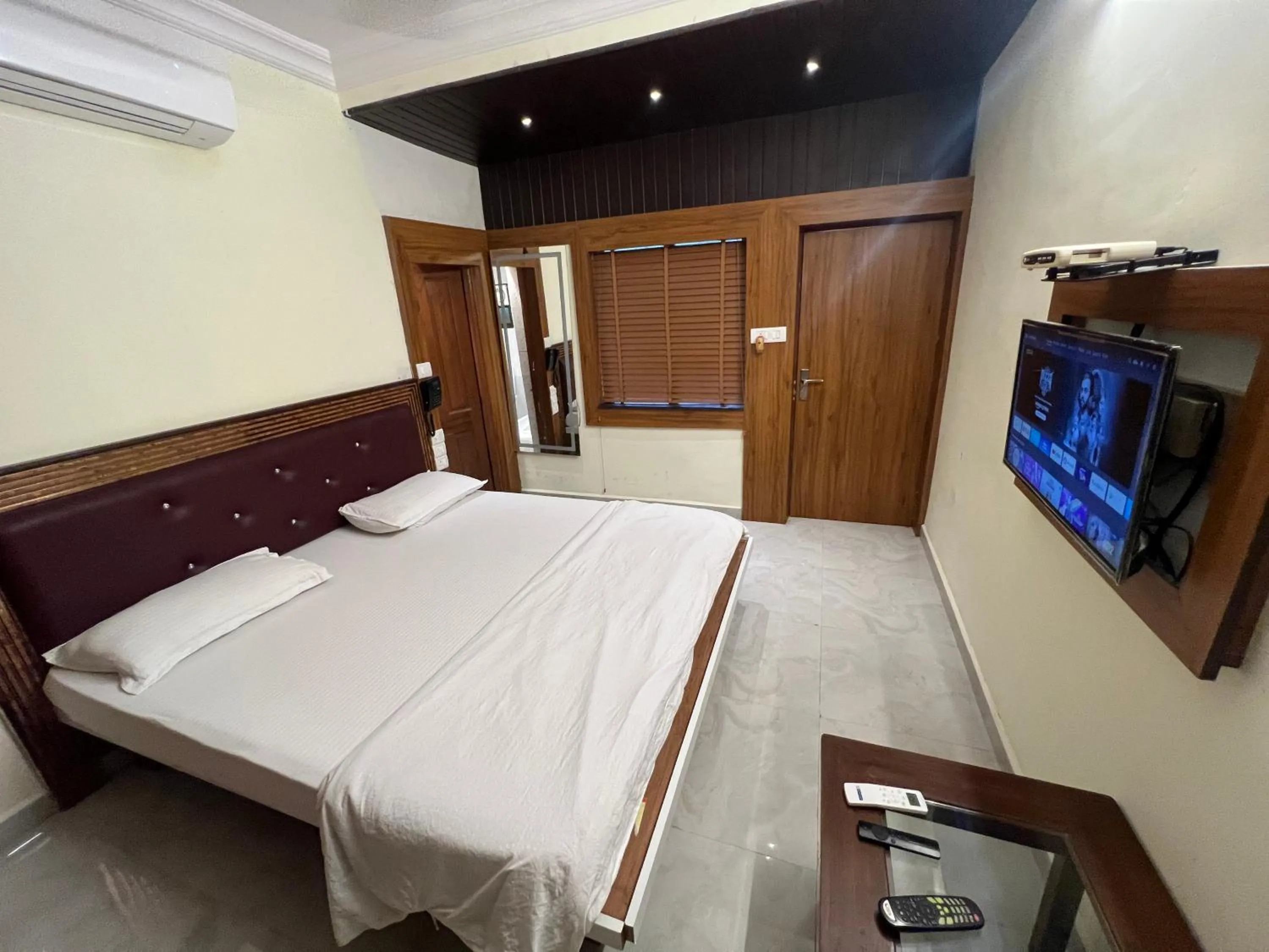 Bed in Royal Palms Luxury Service Apartment