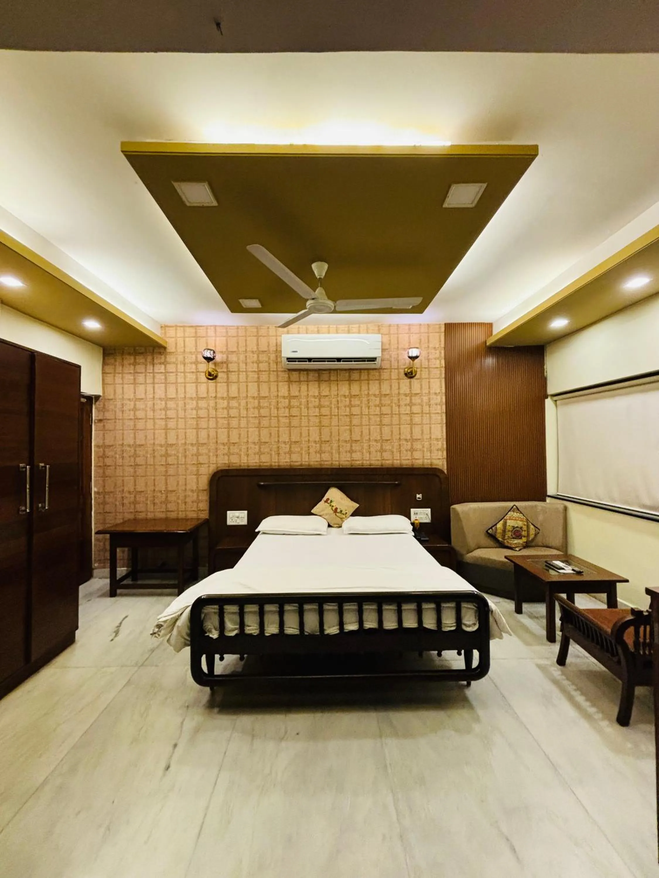 Bed in Royal Palms Luxury Service Apartment