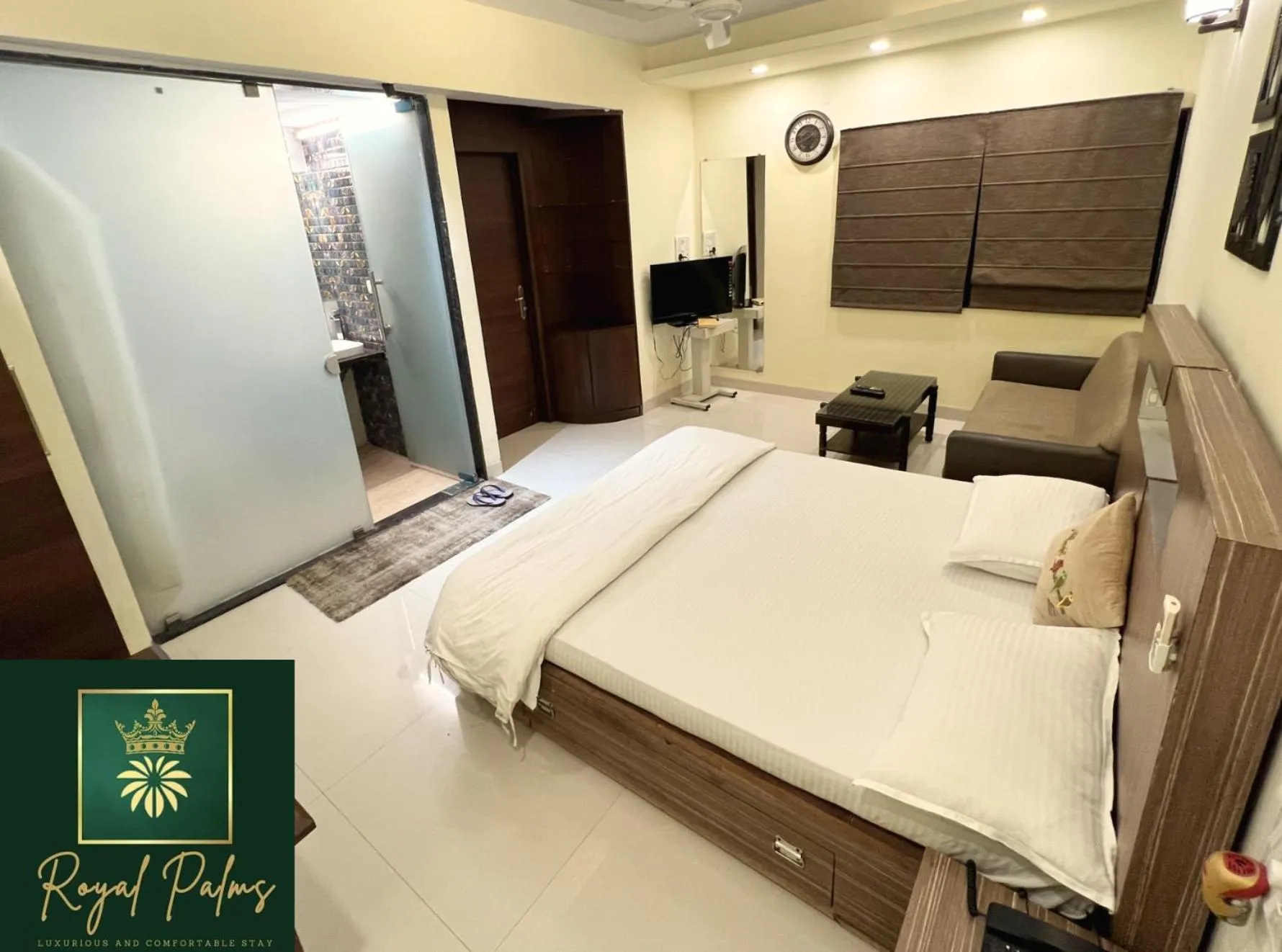 Bed in Royal Palms Luxury Service Apartment