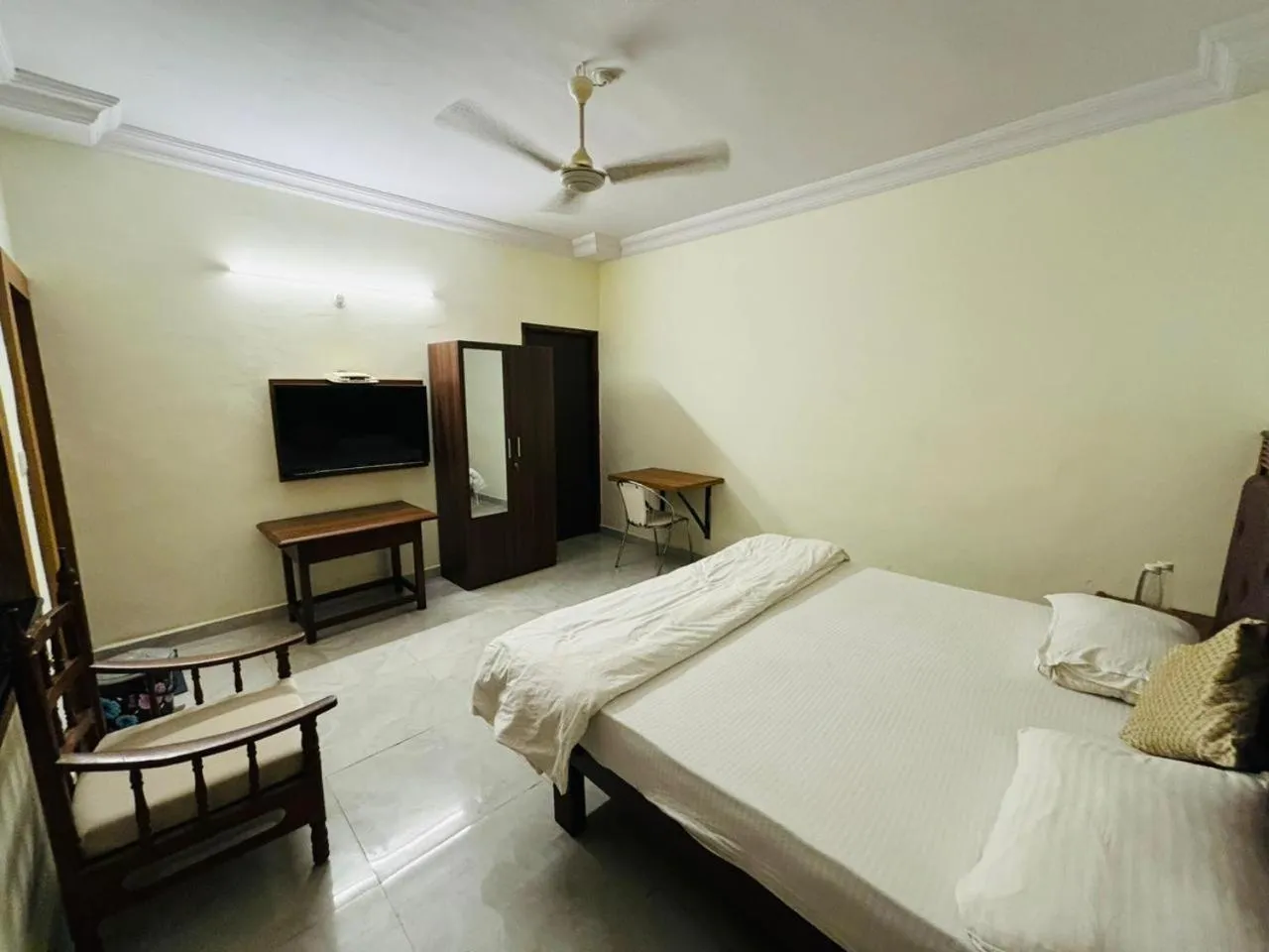 Bed in Royal Palms Luxury Service Apartment