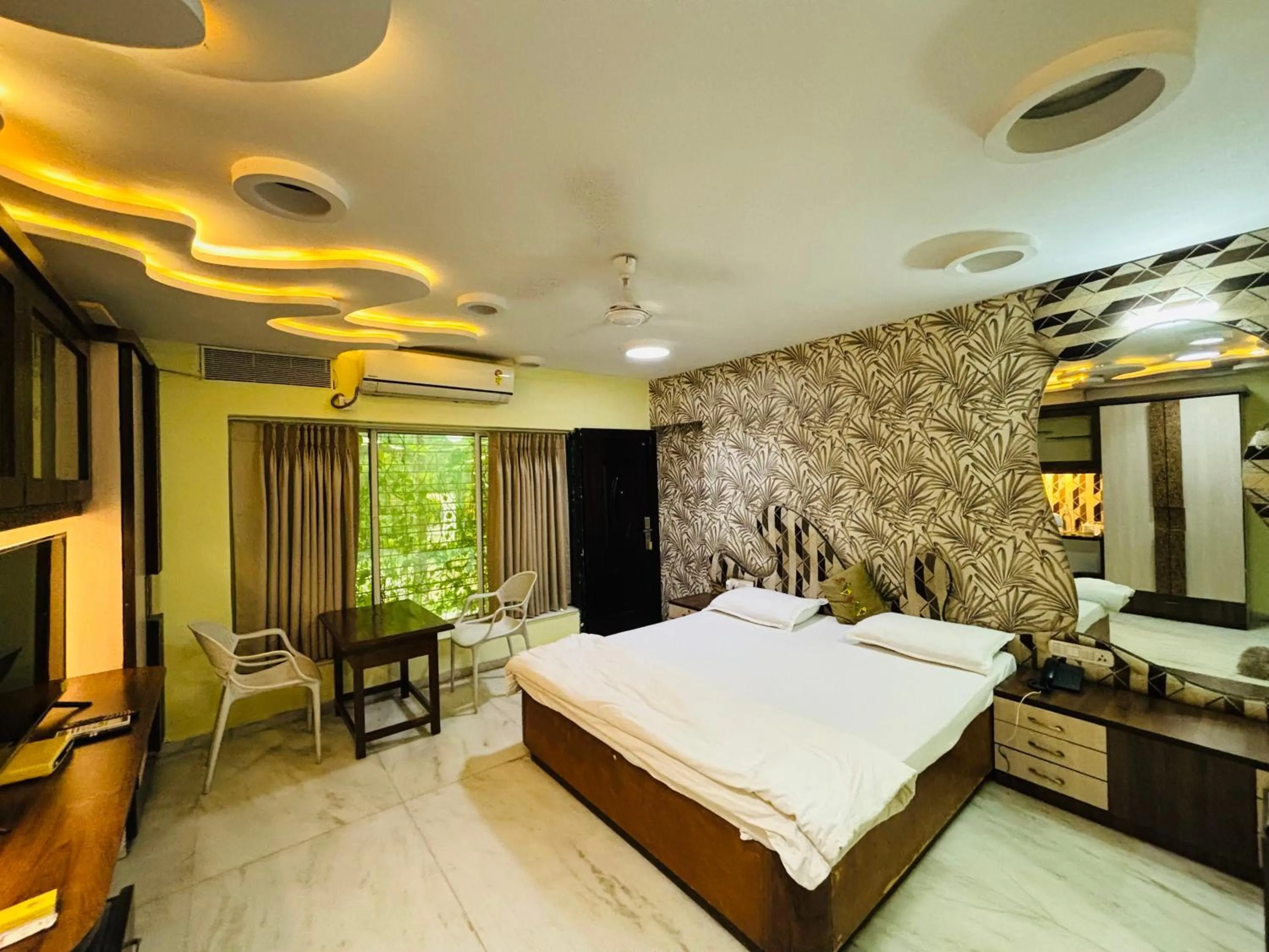 Bed in Royal Palms Luxury Service Apartment