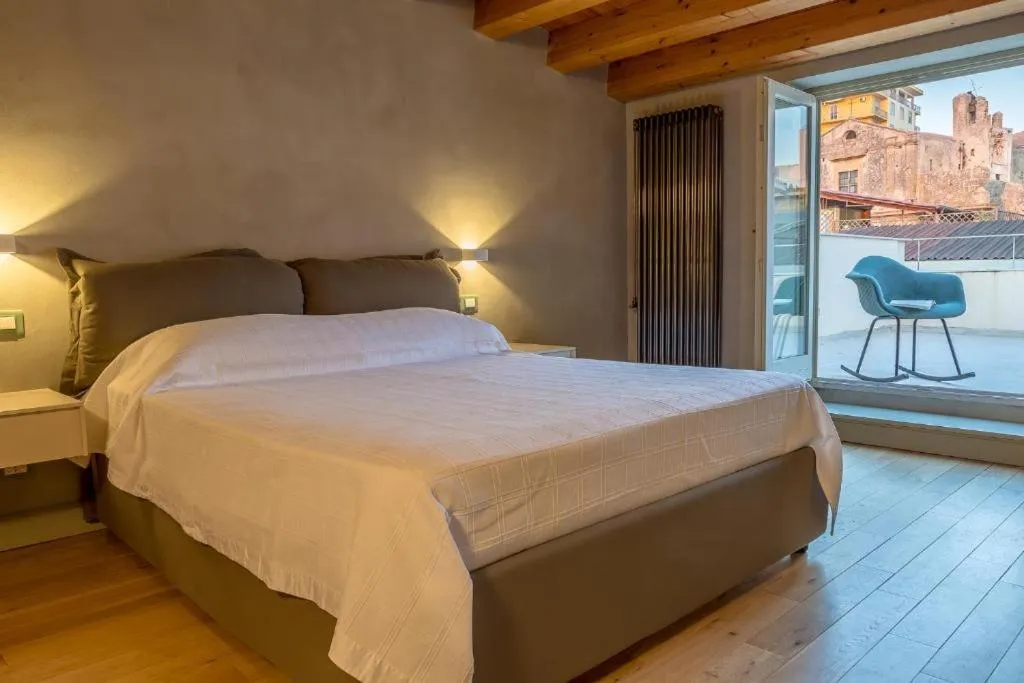 Bed in Cantine De Gregorio Suites
