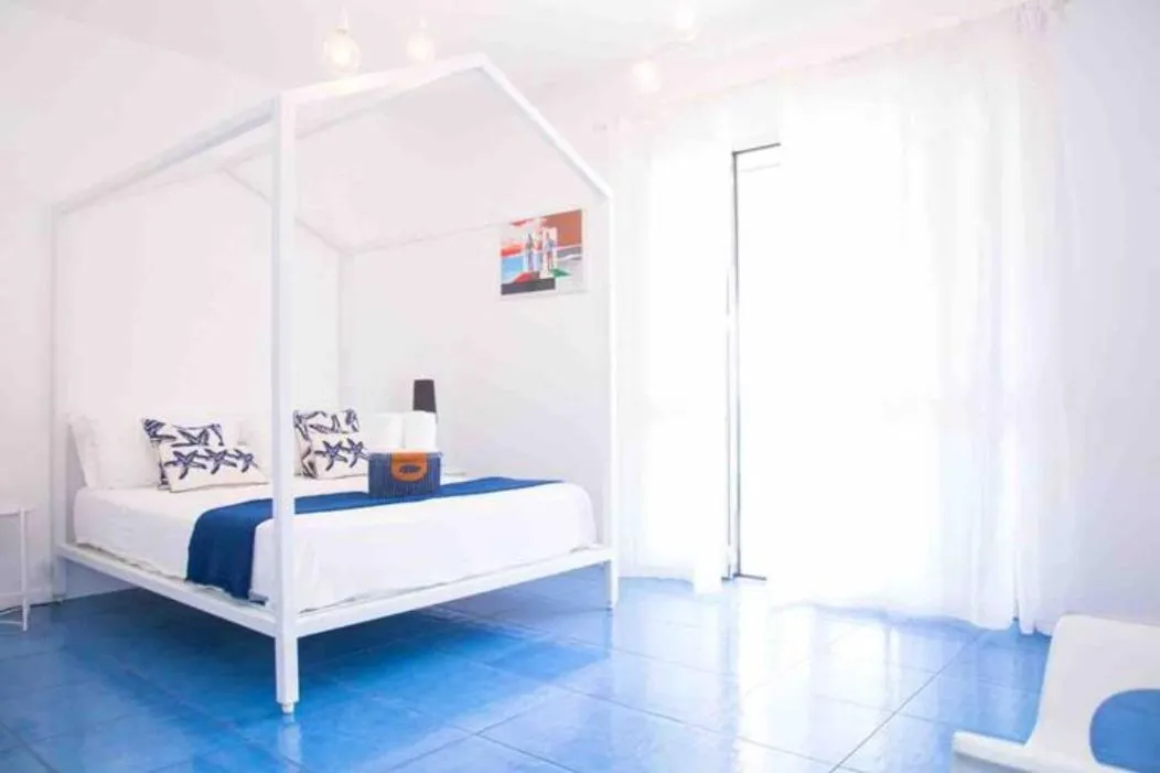 Bed in Amira Beach Villa by Le Dhome Sicily