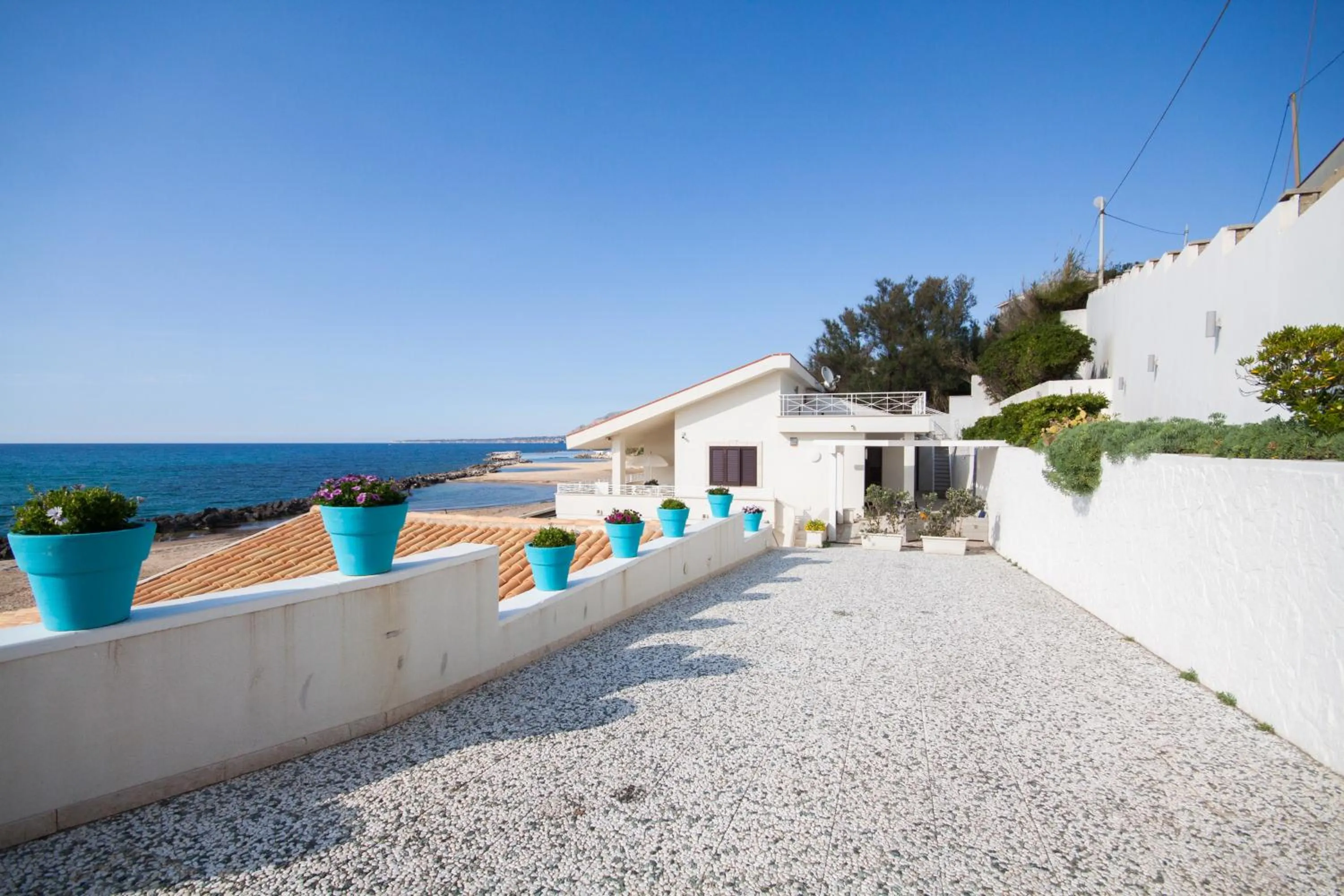 Property building in Amira Beach Villa by Le Dhome Sicily