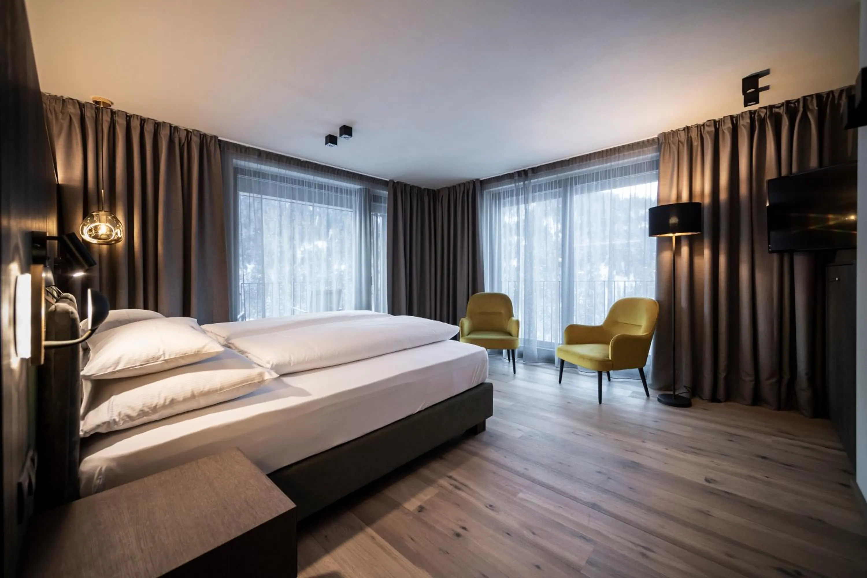 Photo of the whole room, Bed in Plan Murin - Authentic Dolomites Hotel