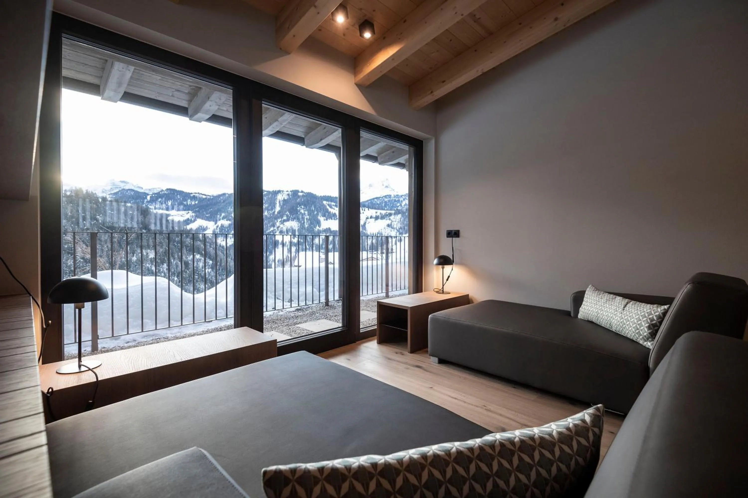 Seating area, Bed in Plan Murin - Authentic Dolomites Hotel