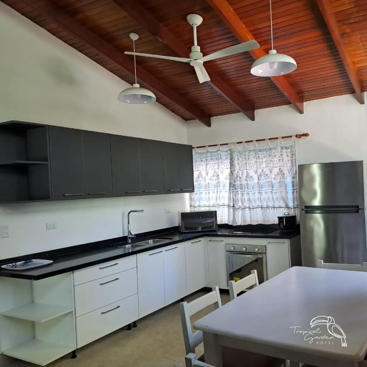 Kitchen or kitchenette in Tropical Garden Hotel