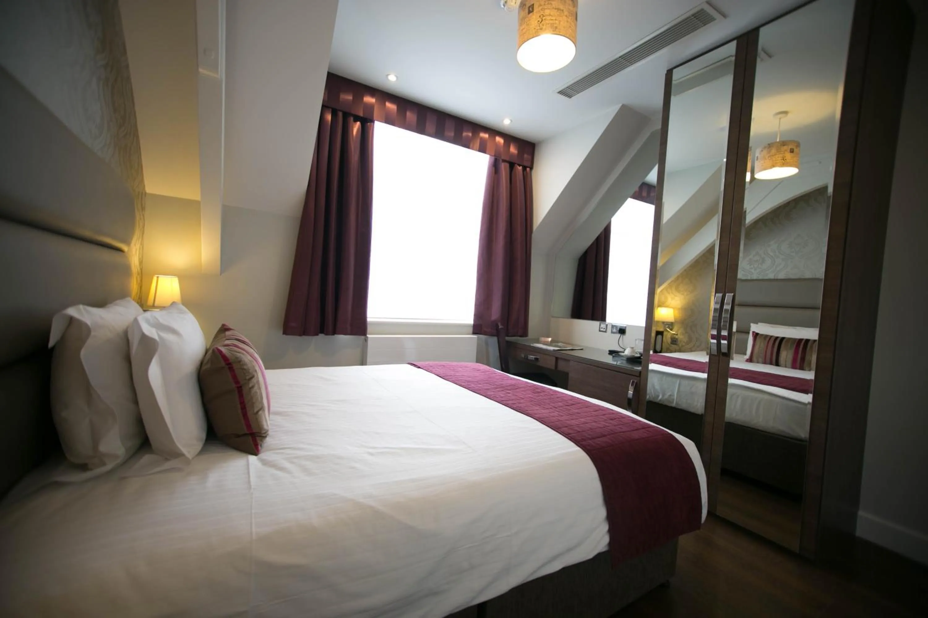 Bed in The Pillar Hotel