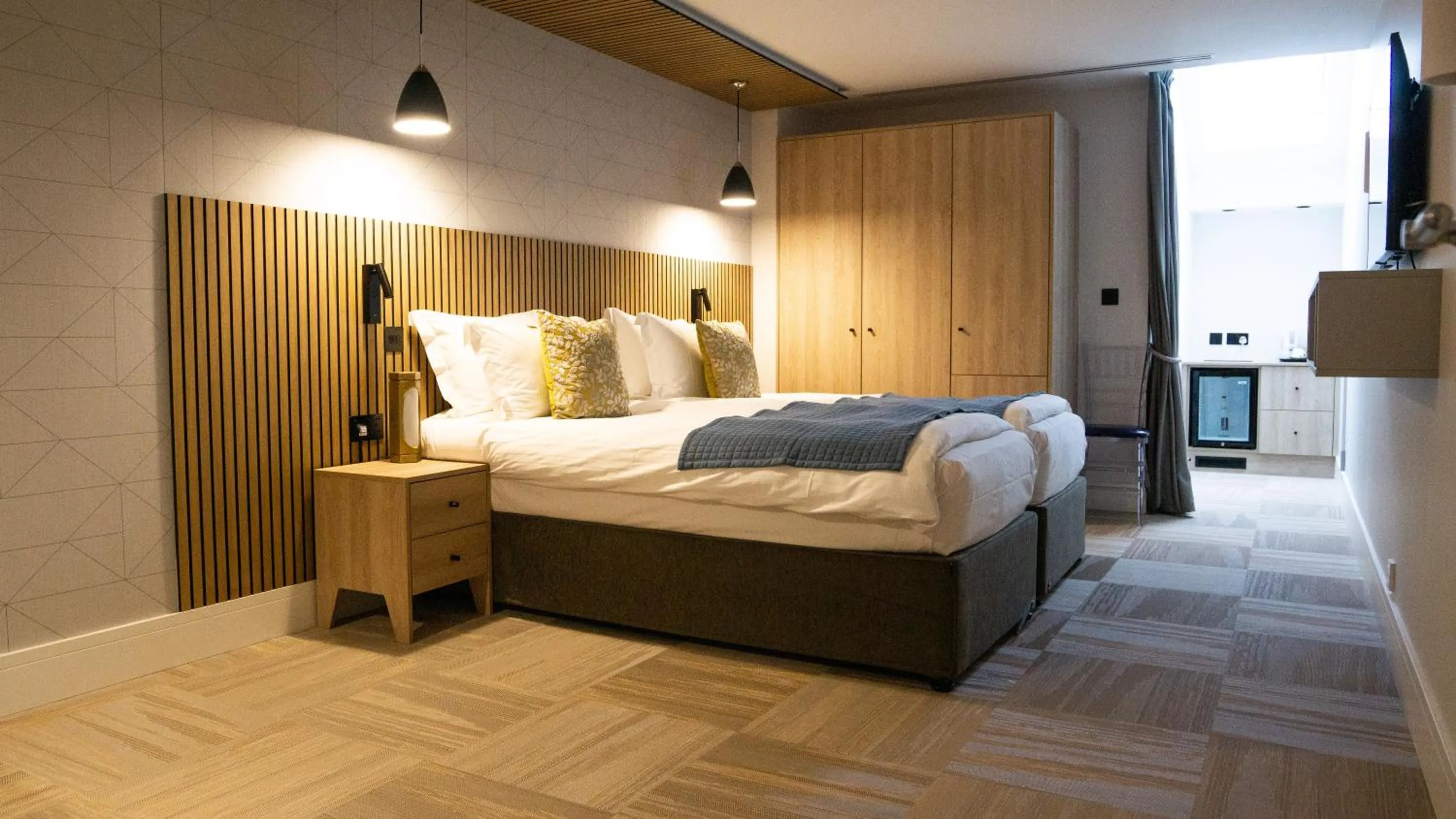 Bed in The Pillar Hotel