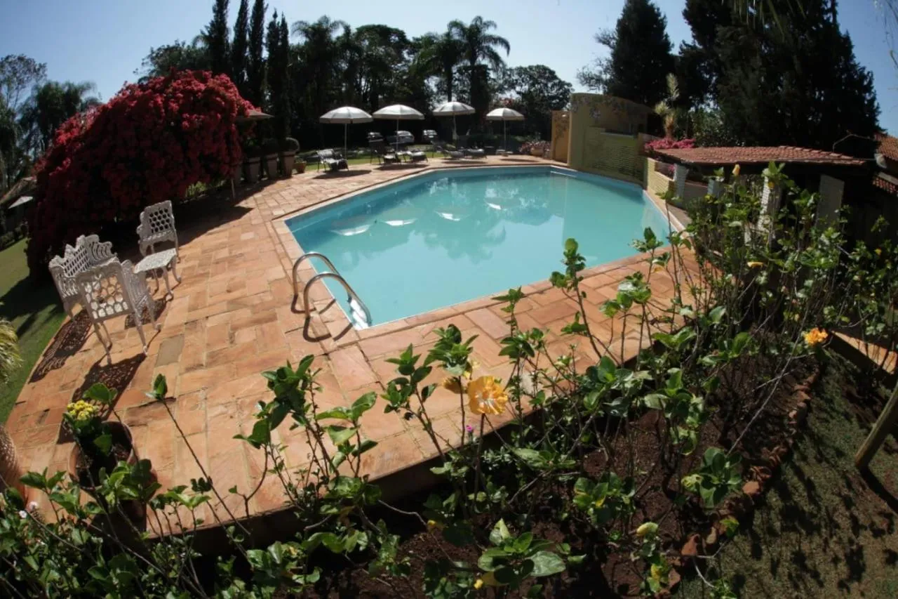 Pool view in Hotel Pousada Chalé das Flores