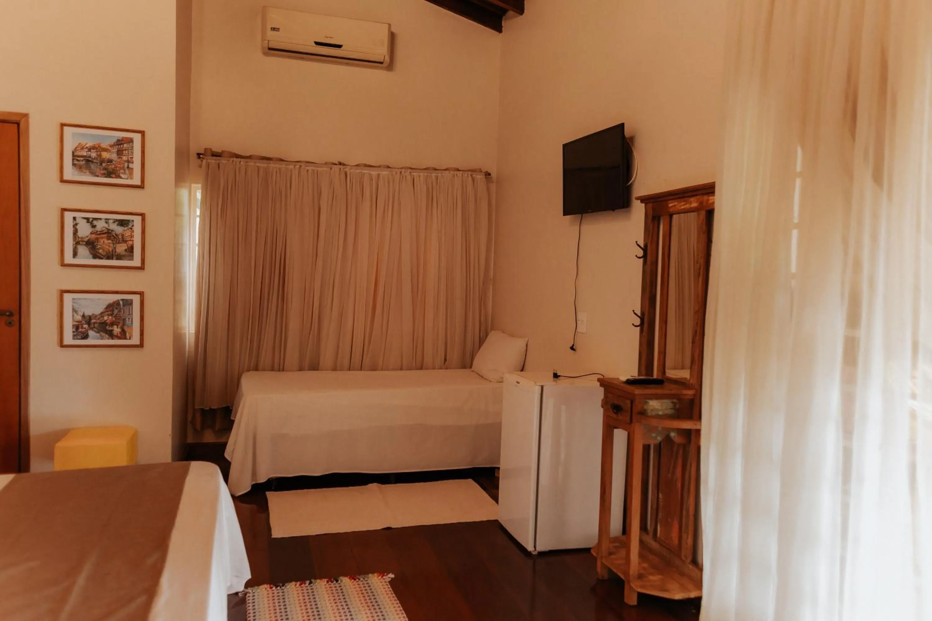 Bed in Hotel Pousada Chalé das Flores