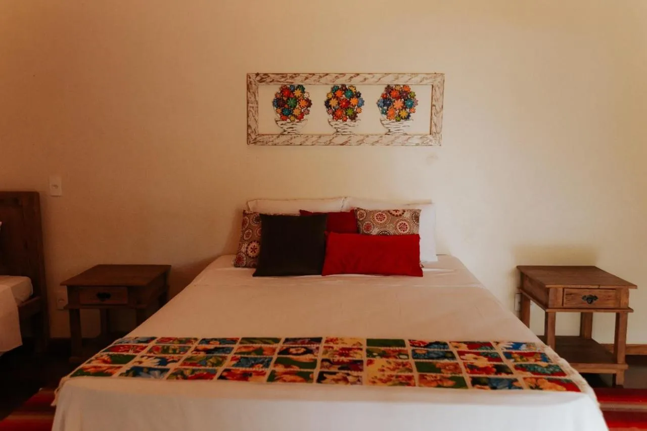 Bed in Hotel Pousada Chalé das Flores