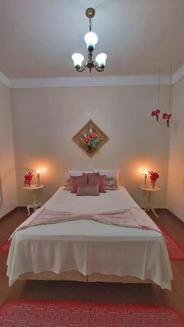 Bed in Hotel Pousada Chalé das Flores