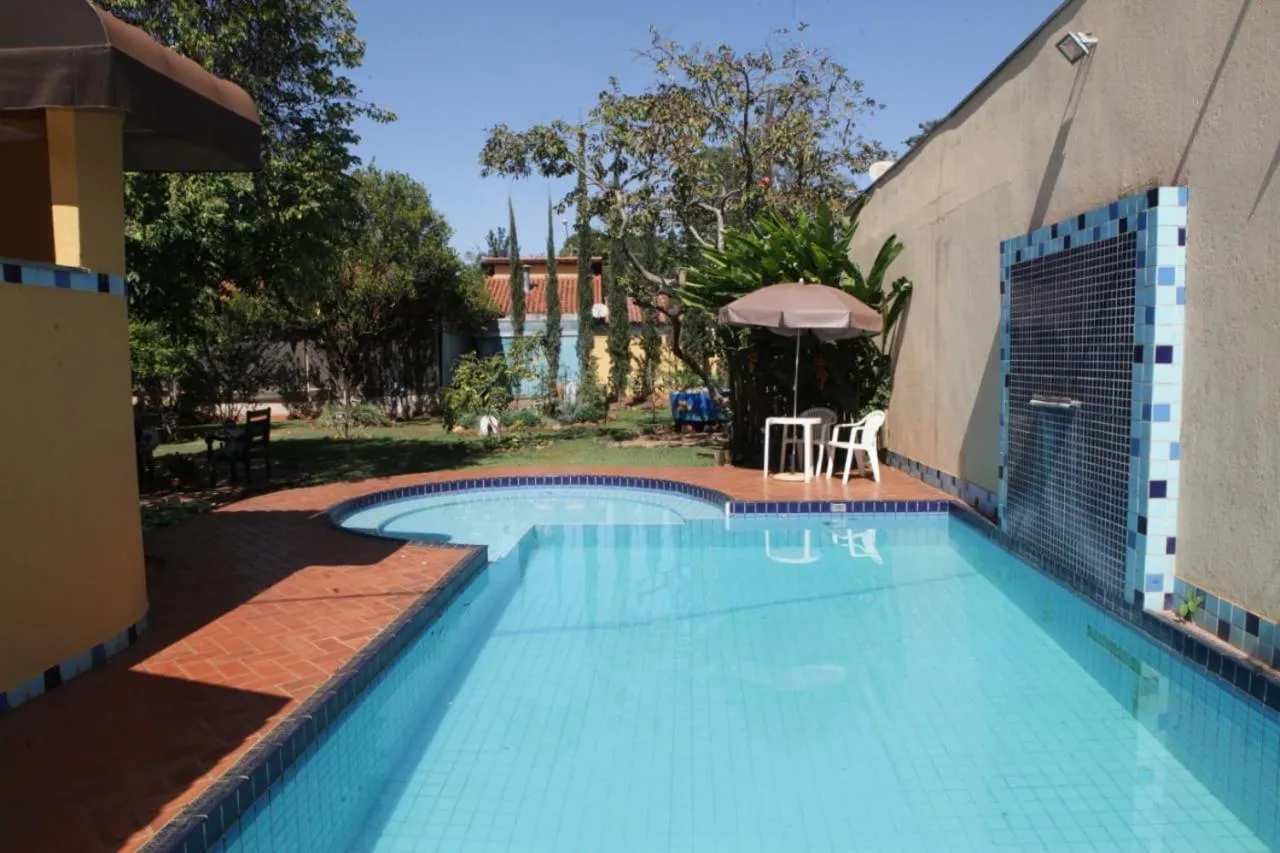 Swimming pool in Hotel Pousada Chalé das Flores