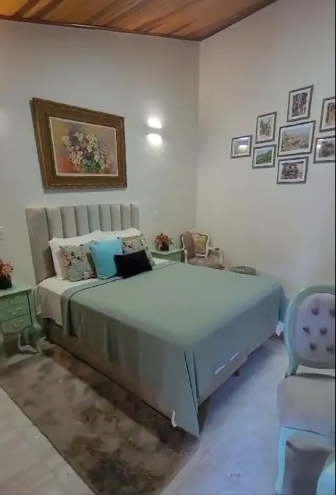 Bed in Hotel Pousada Chalé das Flores