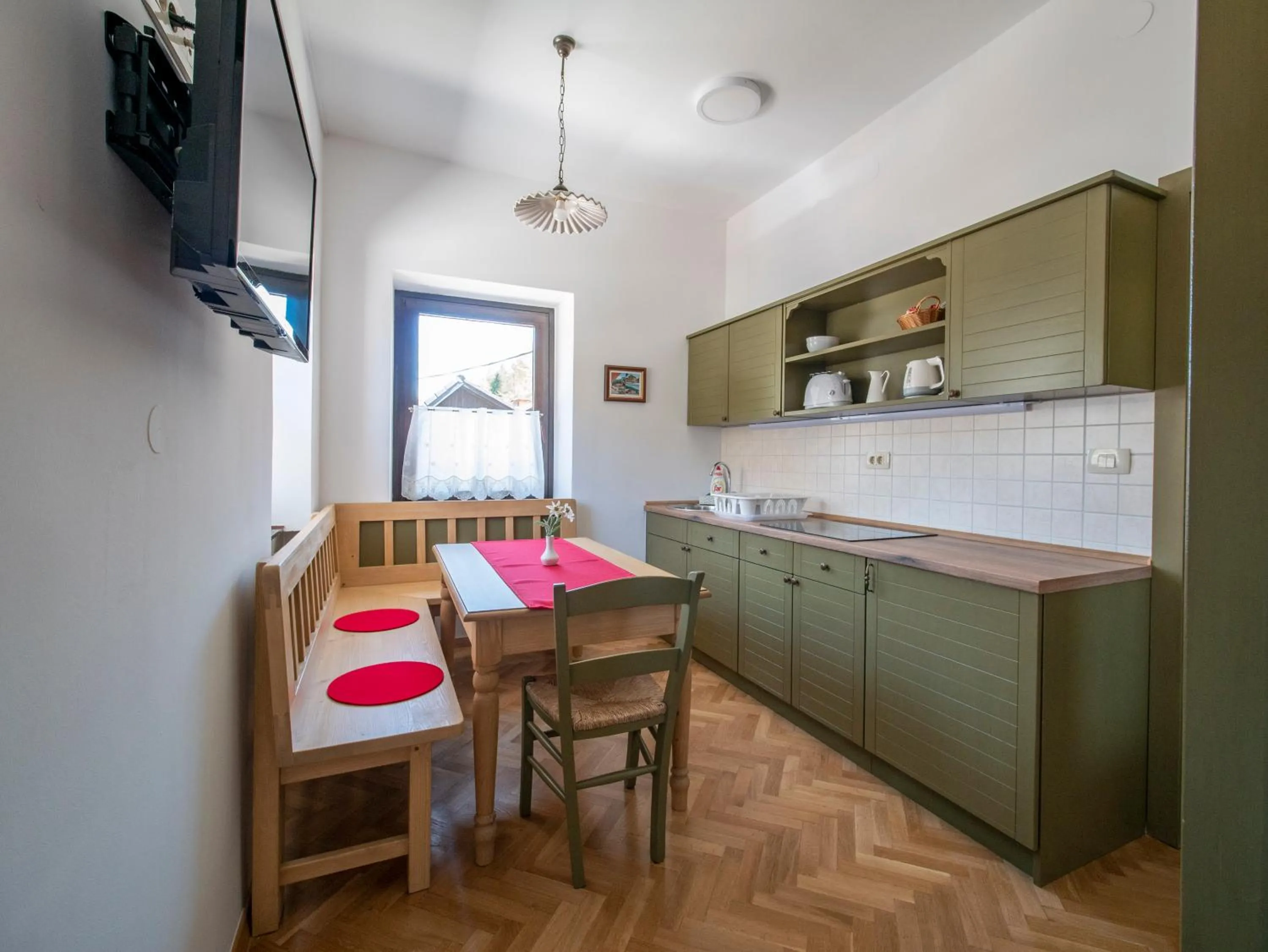 Kitchen or kitchenette in Berghi Hotel and Apartments