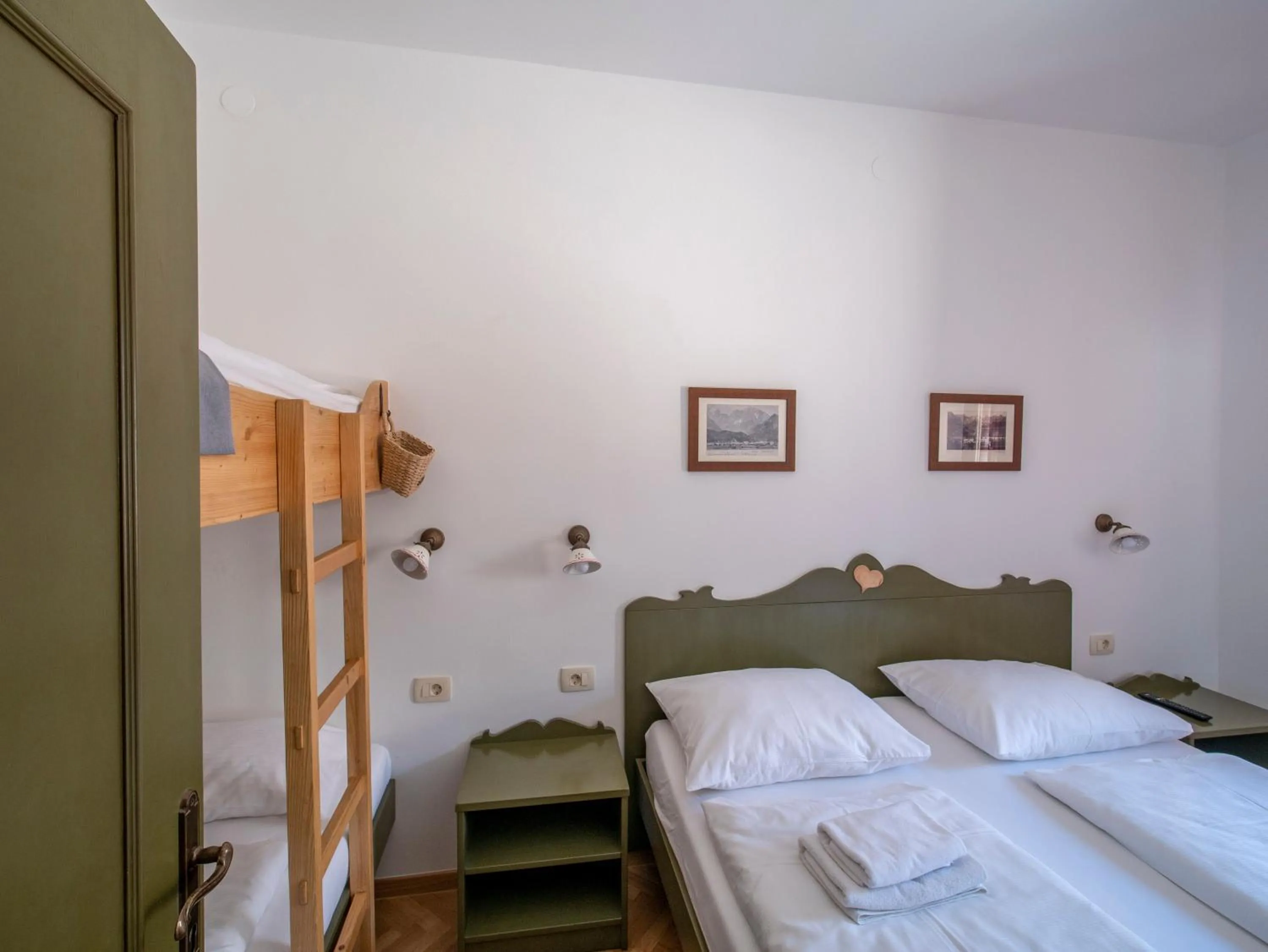Bed in Berghi Hotel and Apartments