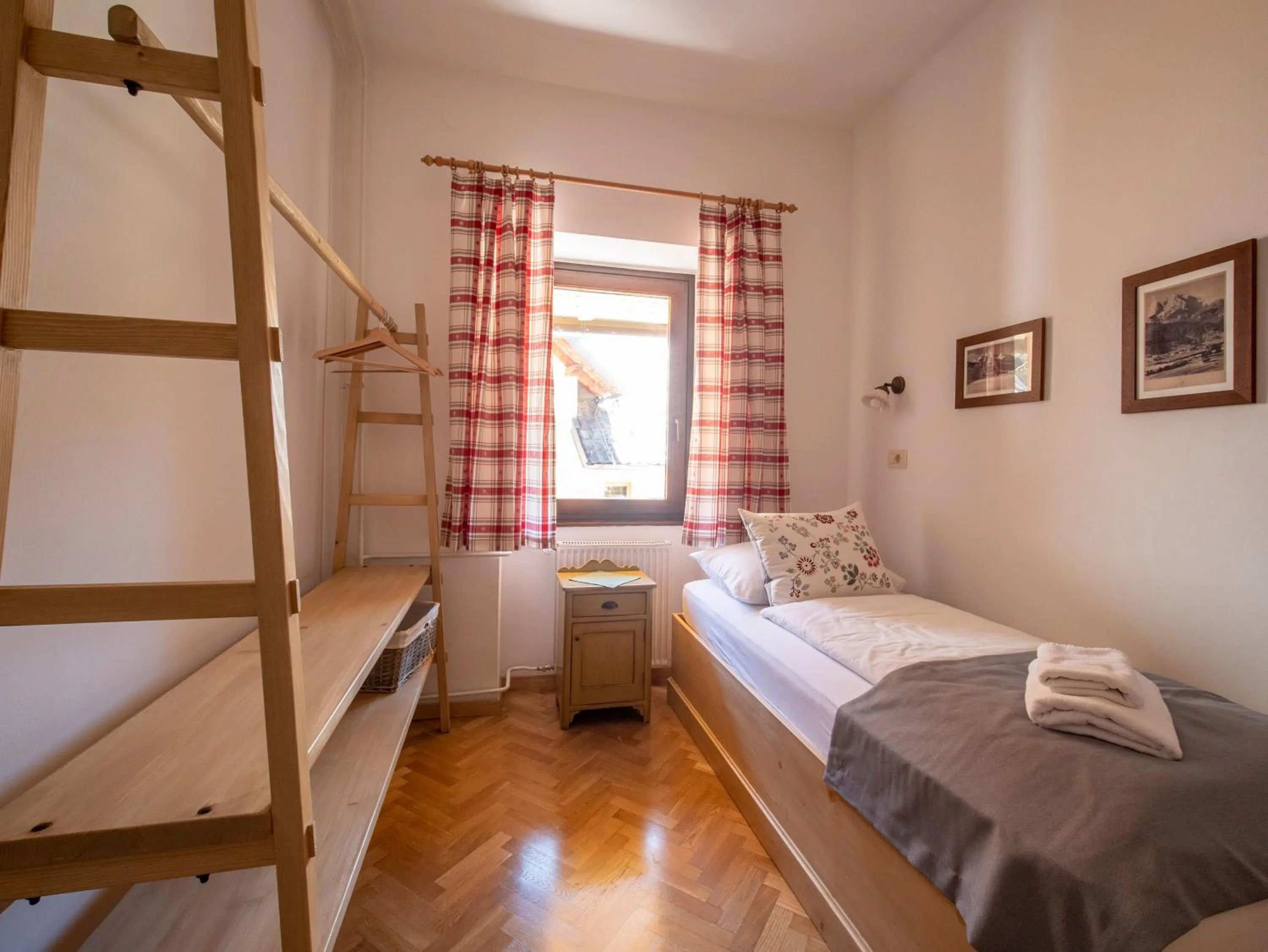 Bed in Berghi Hotel and Apartments