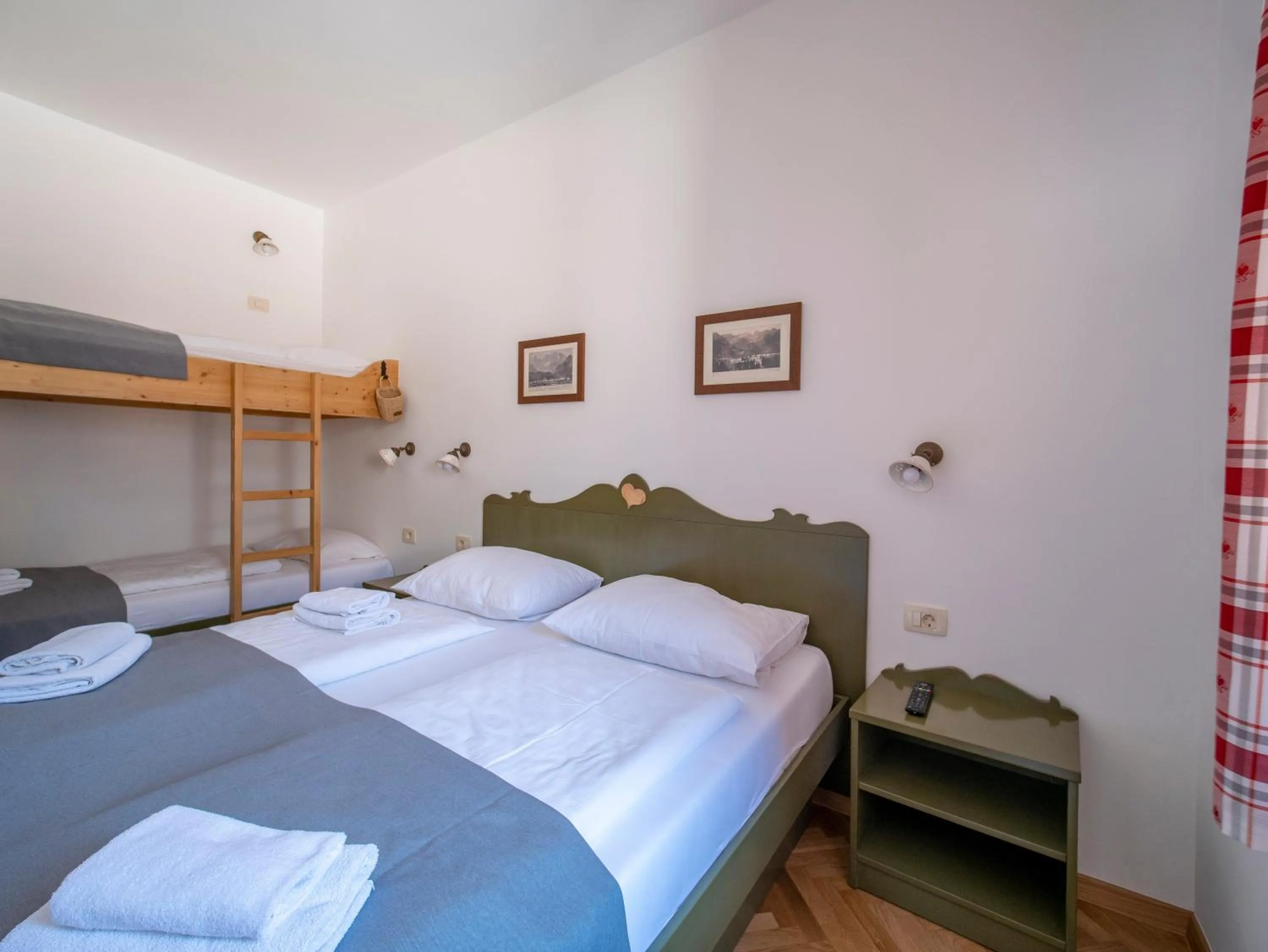 Bed in Berghi Hotel and Apartments