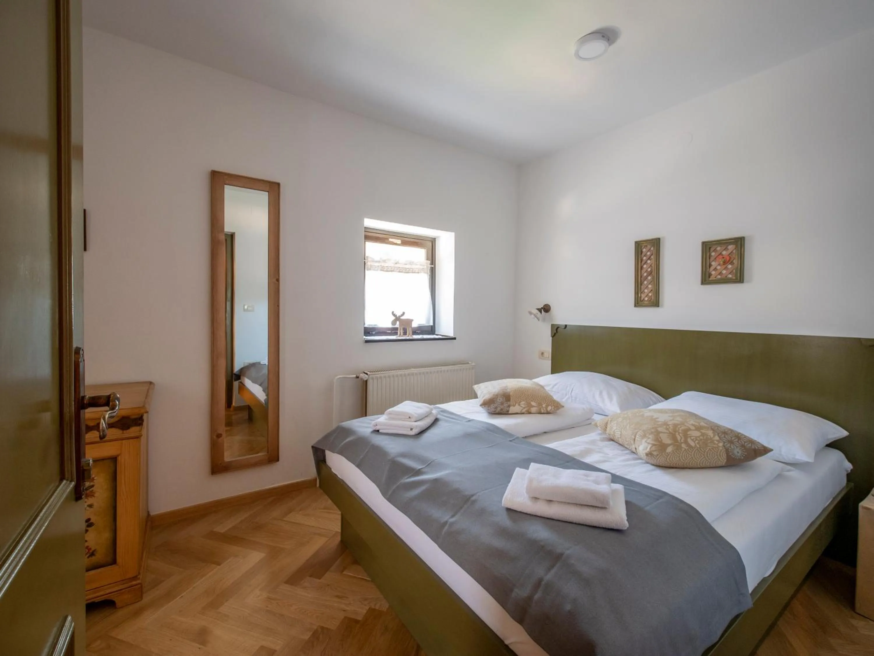 Bed in Berghi Hotel and Apartments