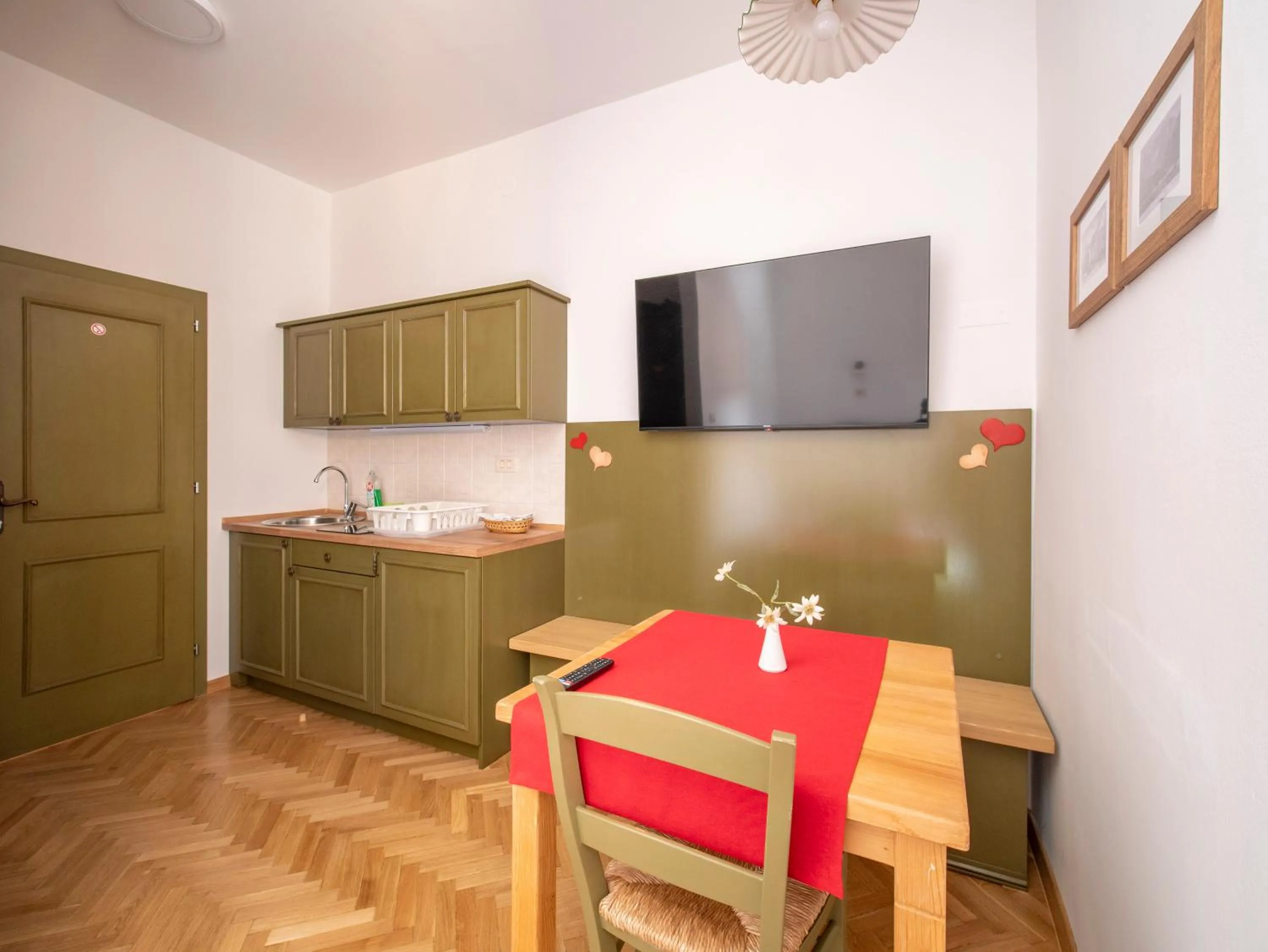 Kitchen or kitchenette in Berghi Hotel and Apartments
